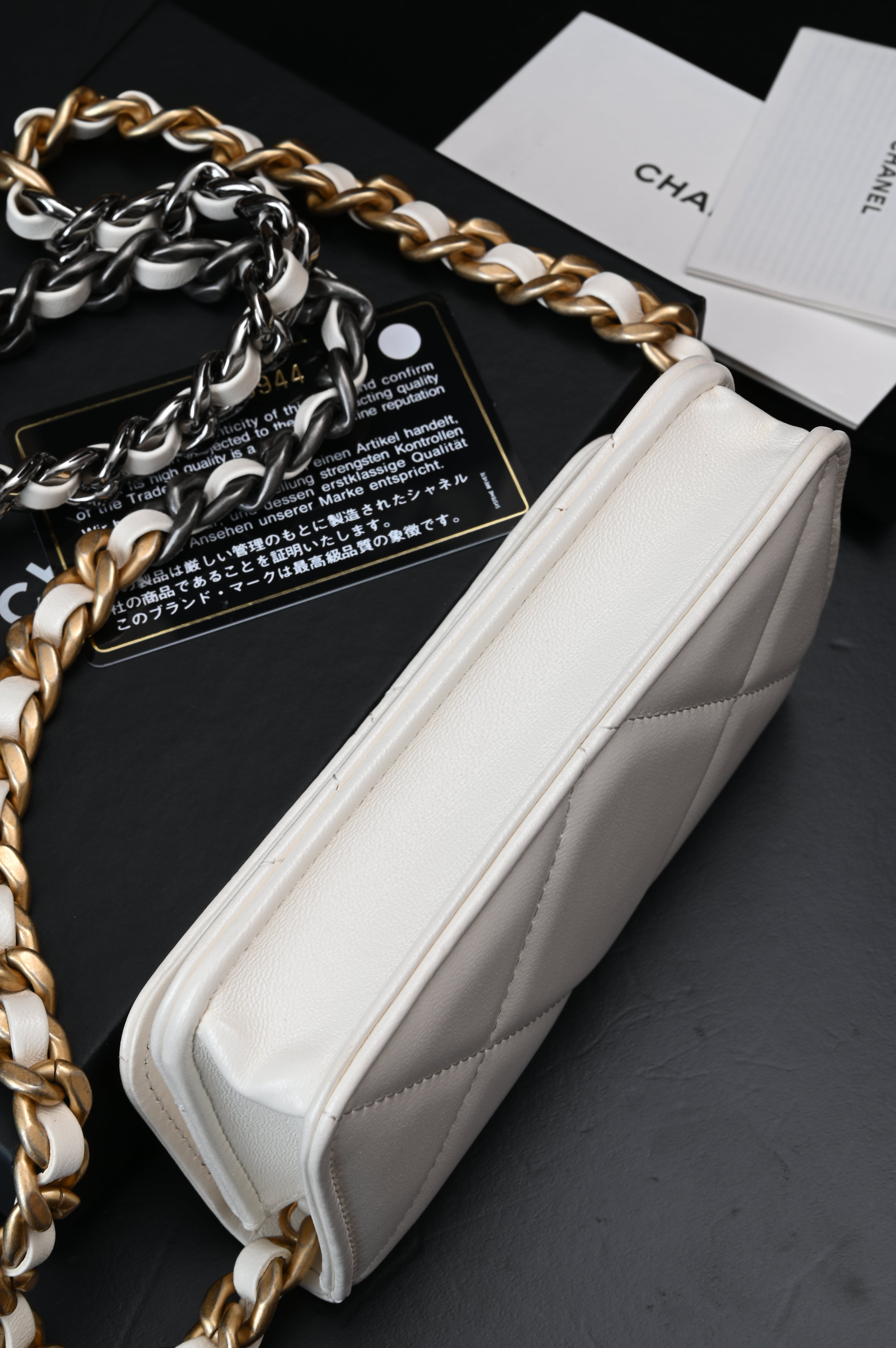 Chanel White Quilted Lambskin Chanel 19 Flap Clutch Gold and Ruthenium Hardware, 2021