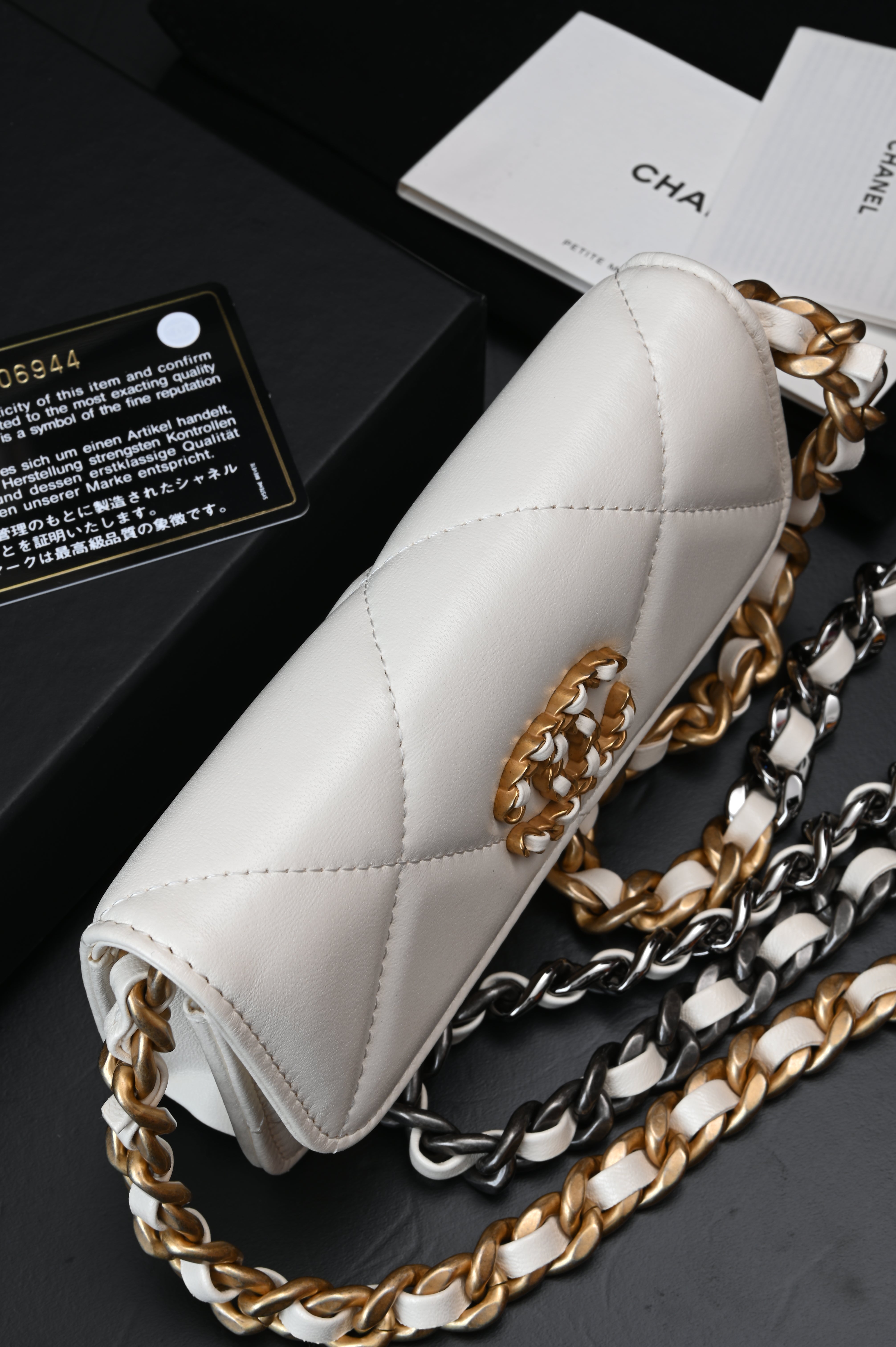 Chanel White Quilted Lambskin Chanel 19 Flap Clutch Gold and Ruthenium Hardware, 2021