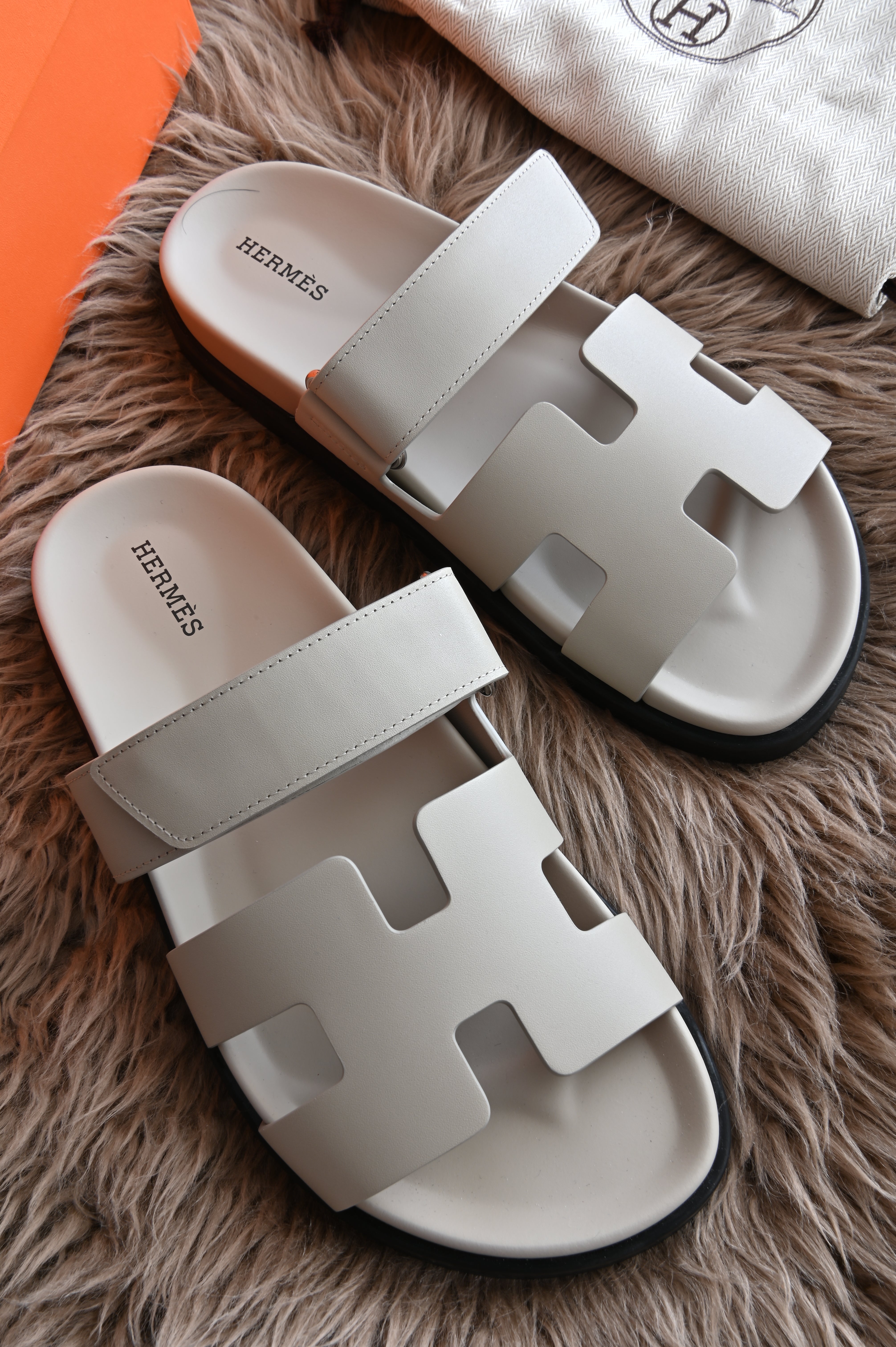 Hermes Chypre Sandals in Bone Grey
