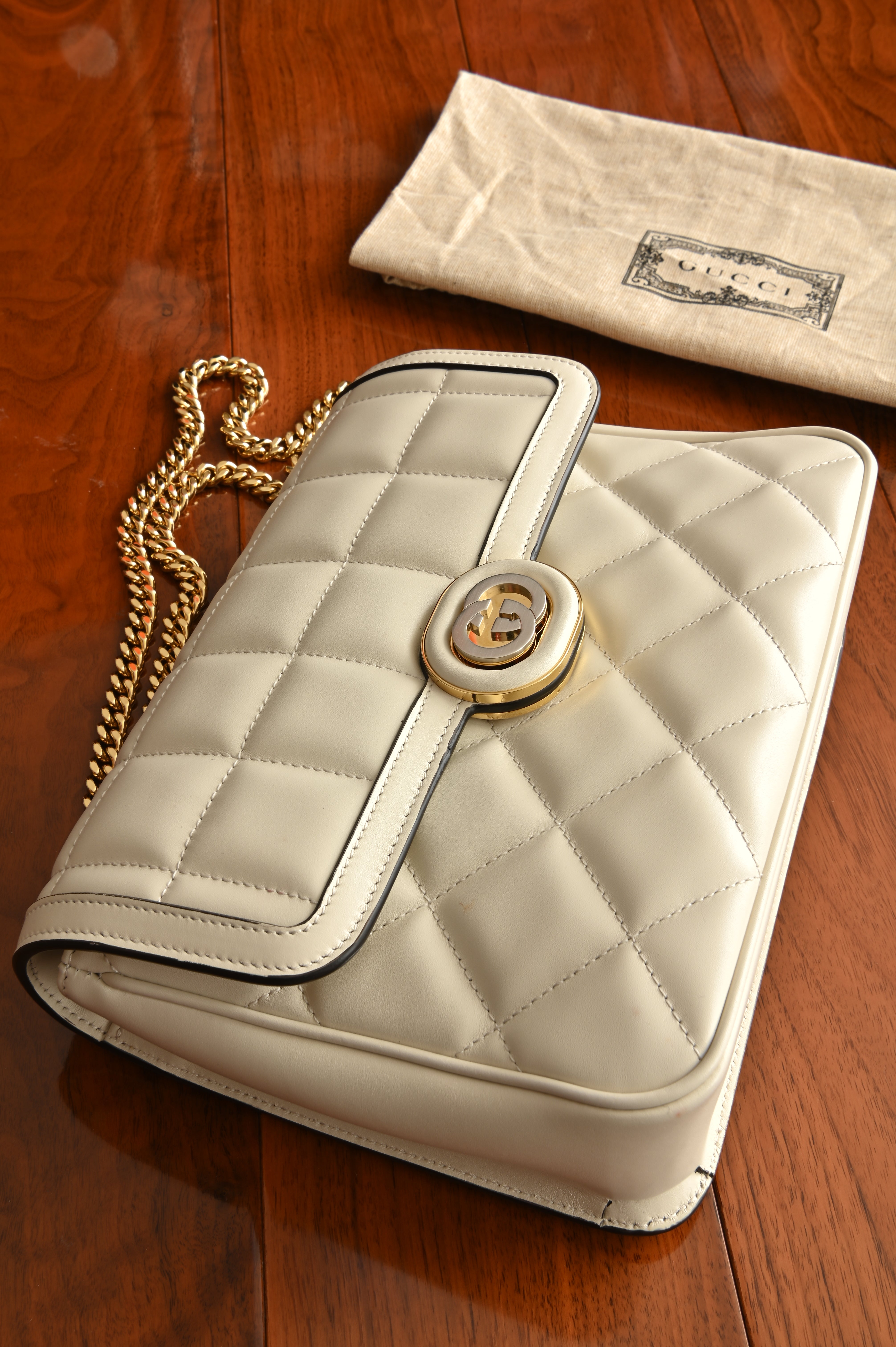Gucci Deco Small Shoulder Bag in White Quilted Calf leather with Gold Silver-toned Lock front