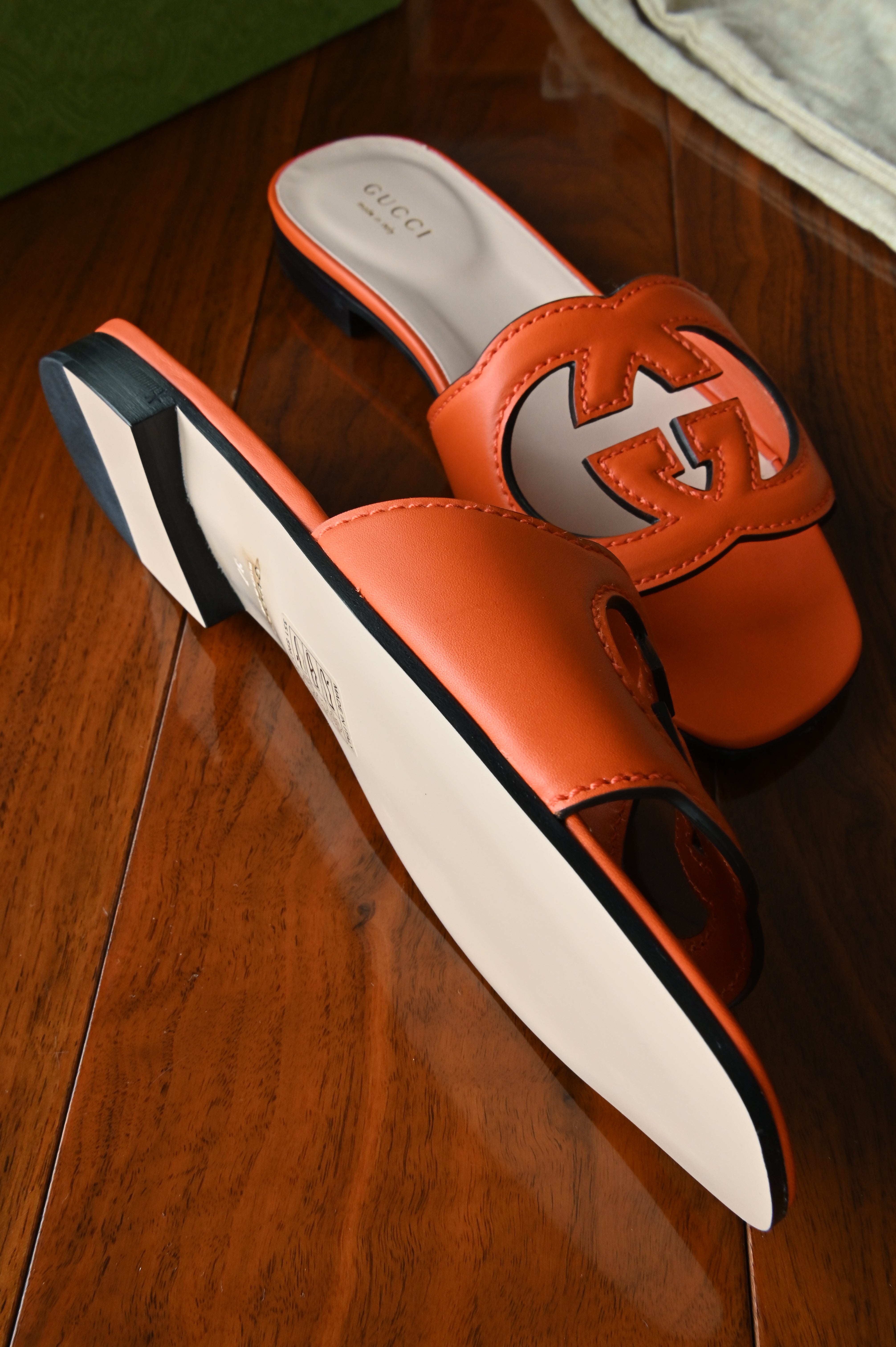 Gucci GG Orange Sandals Flats left