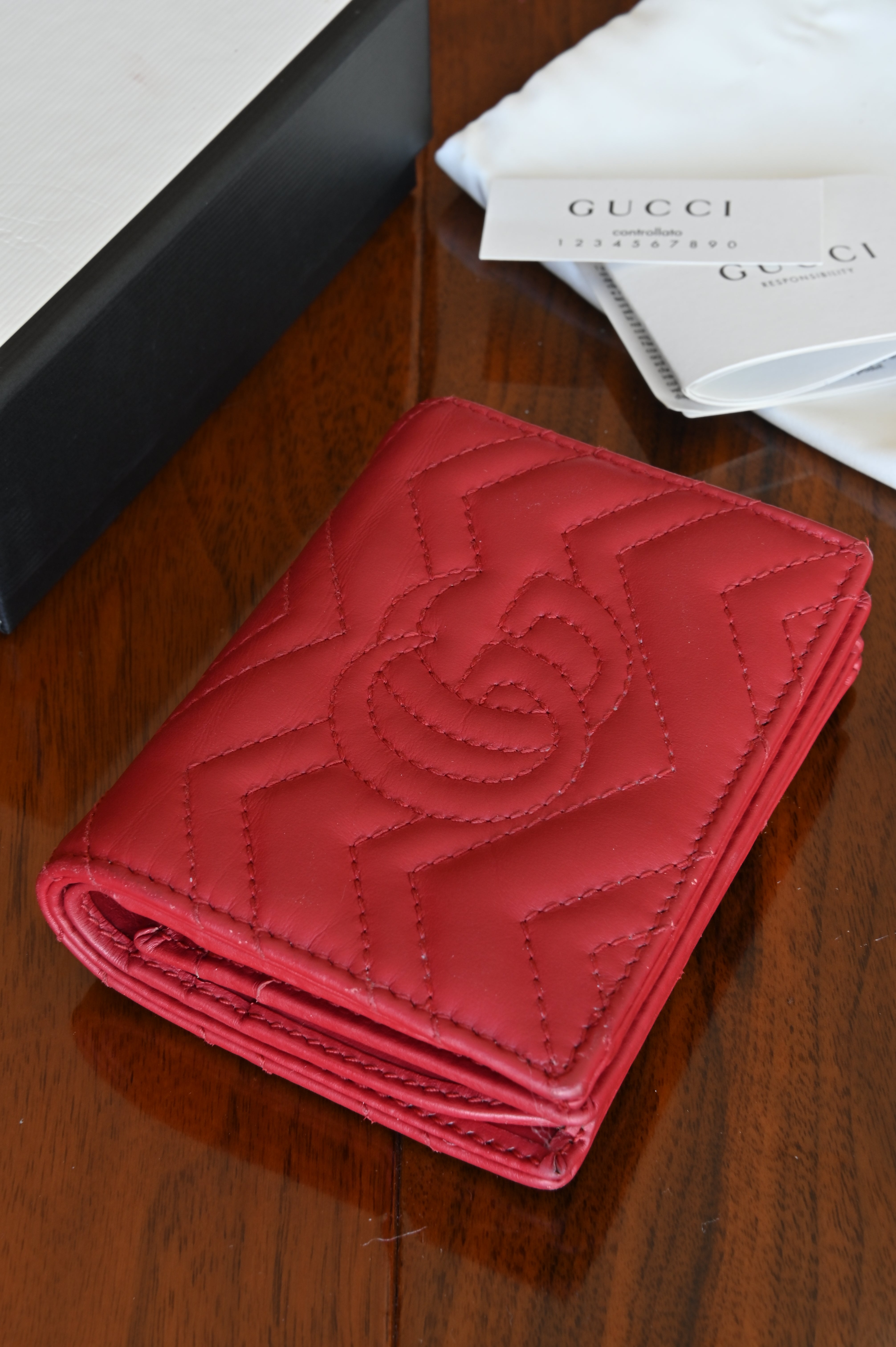 Gucci Red Quilted Compact Wallet in Gold back