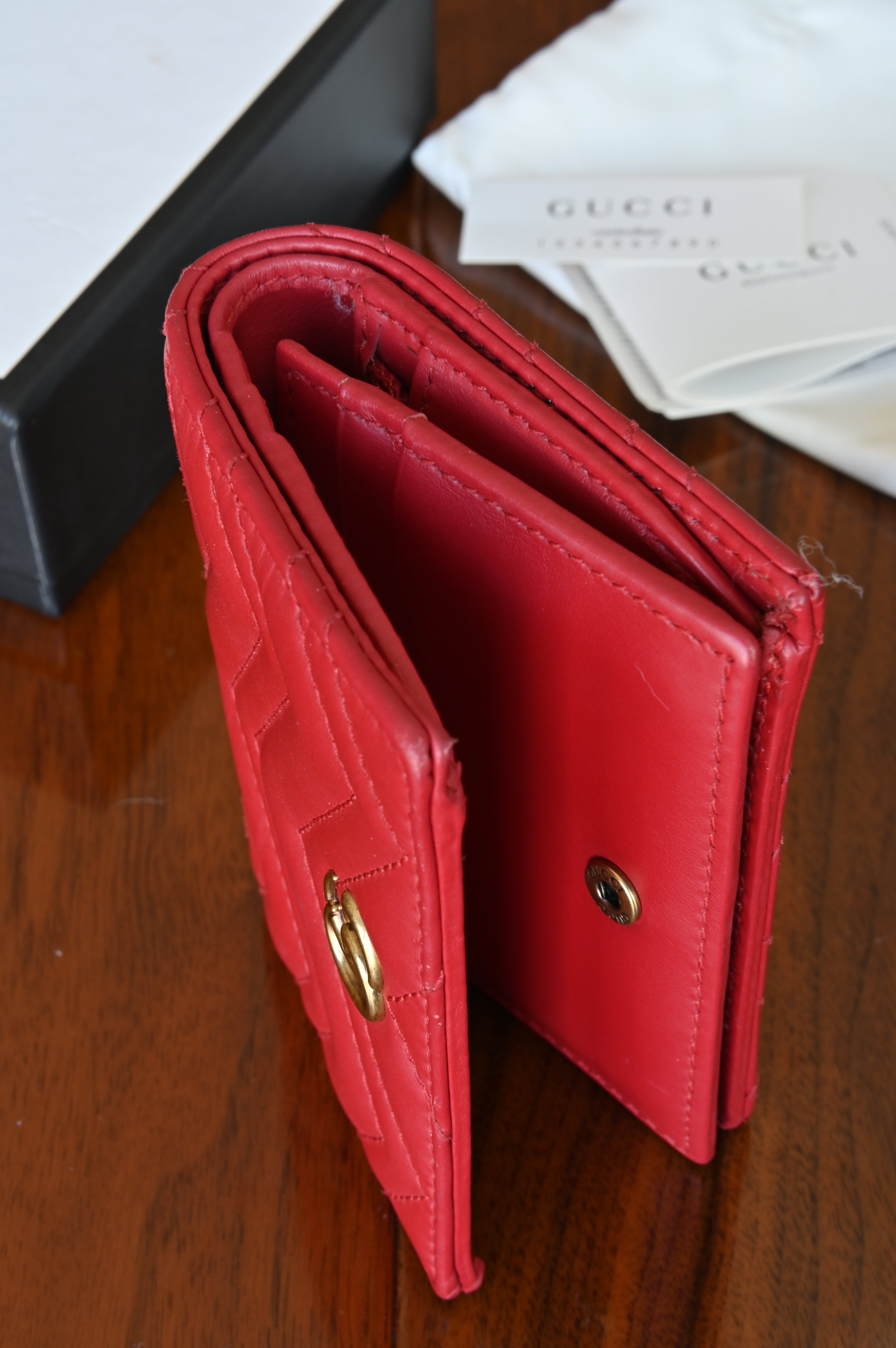 Gucci Red Quilted Compact Wallet in Gold right