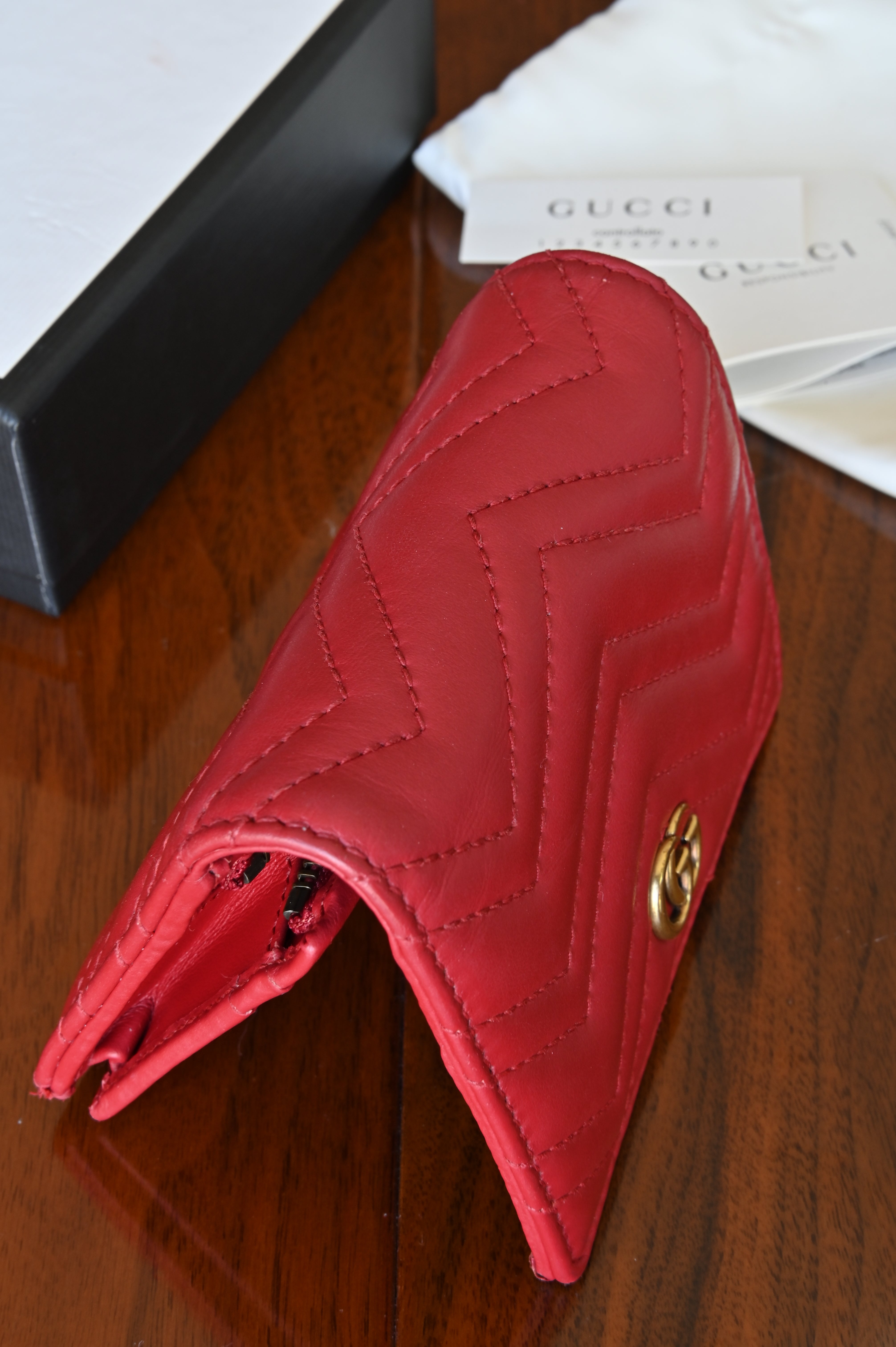 Gucci Red Quilted Compact Wallet in Gold top