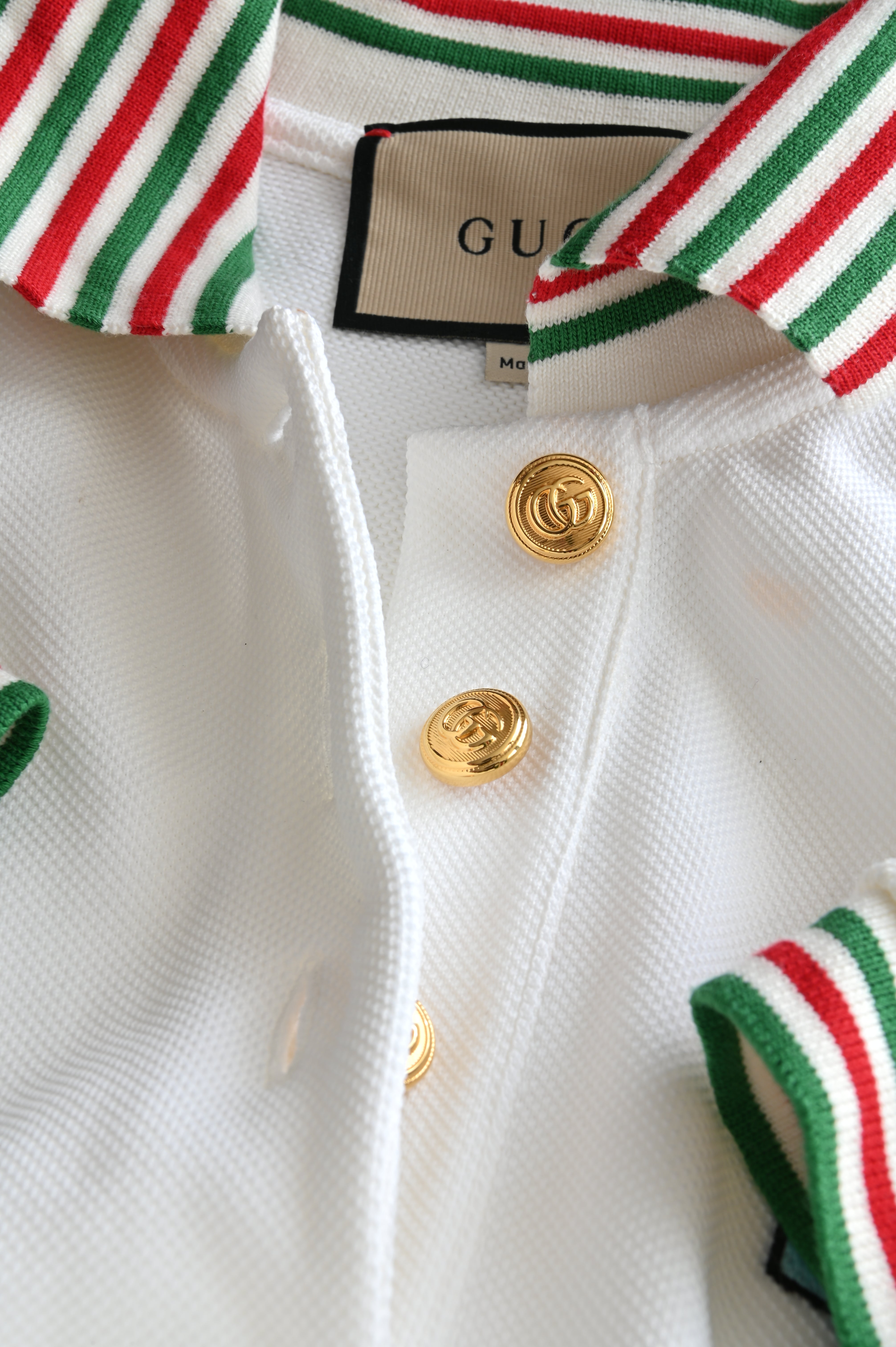 Gucci Tennis Dress in white with Gucci color detail buttons
