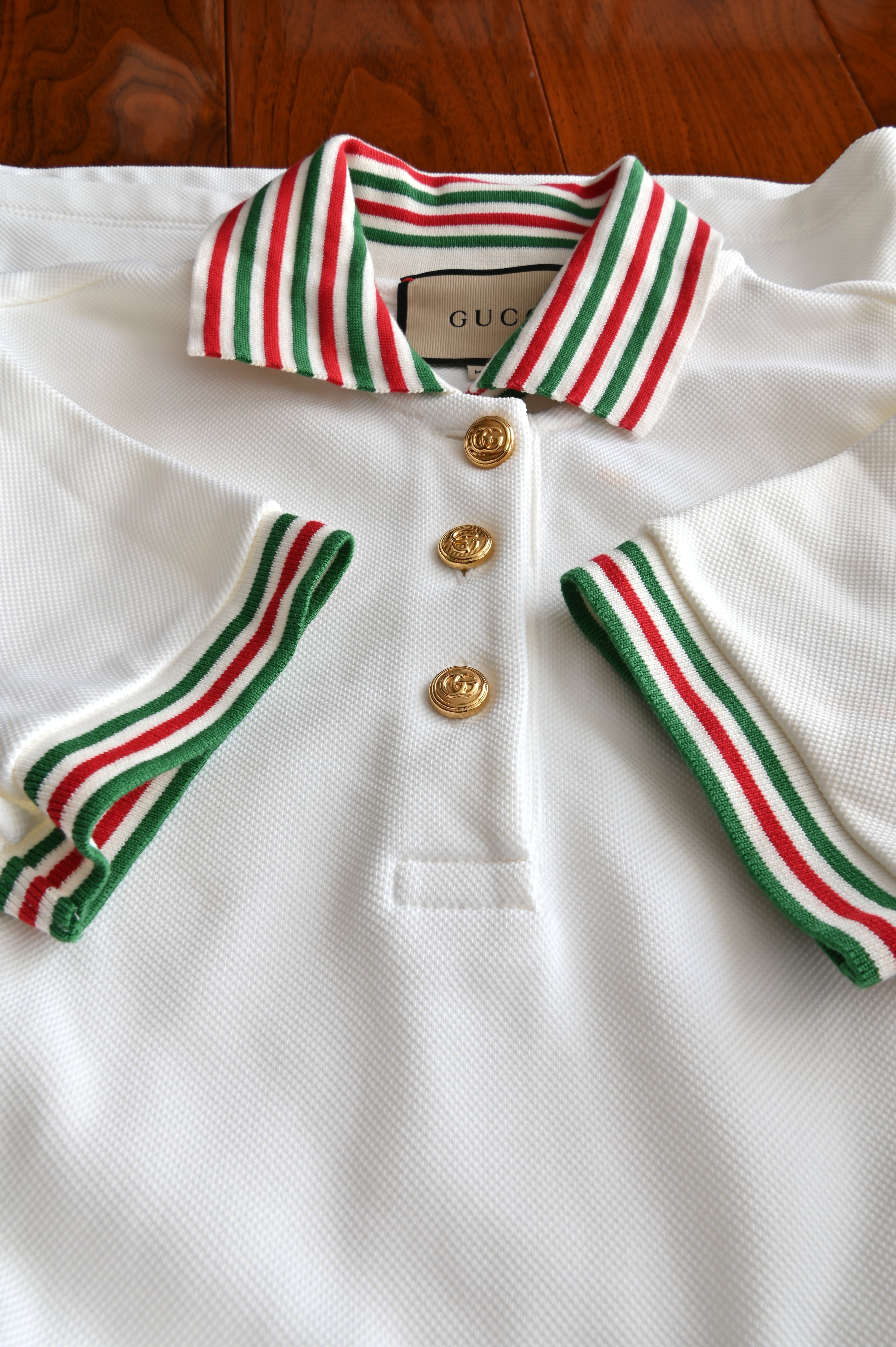 Gucci Tennis Dress in white with Gucci color detail front two