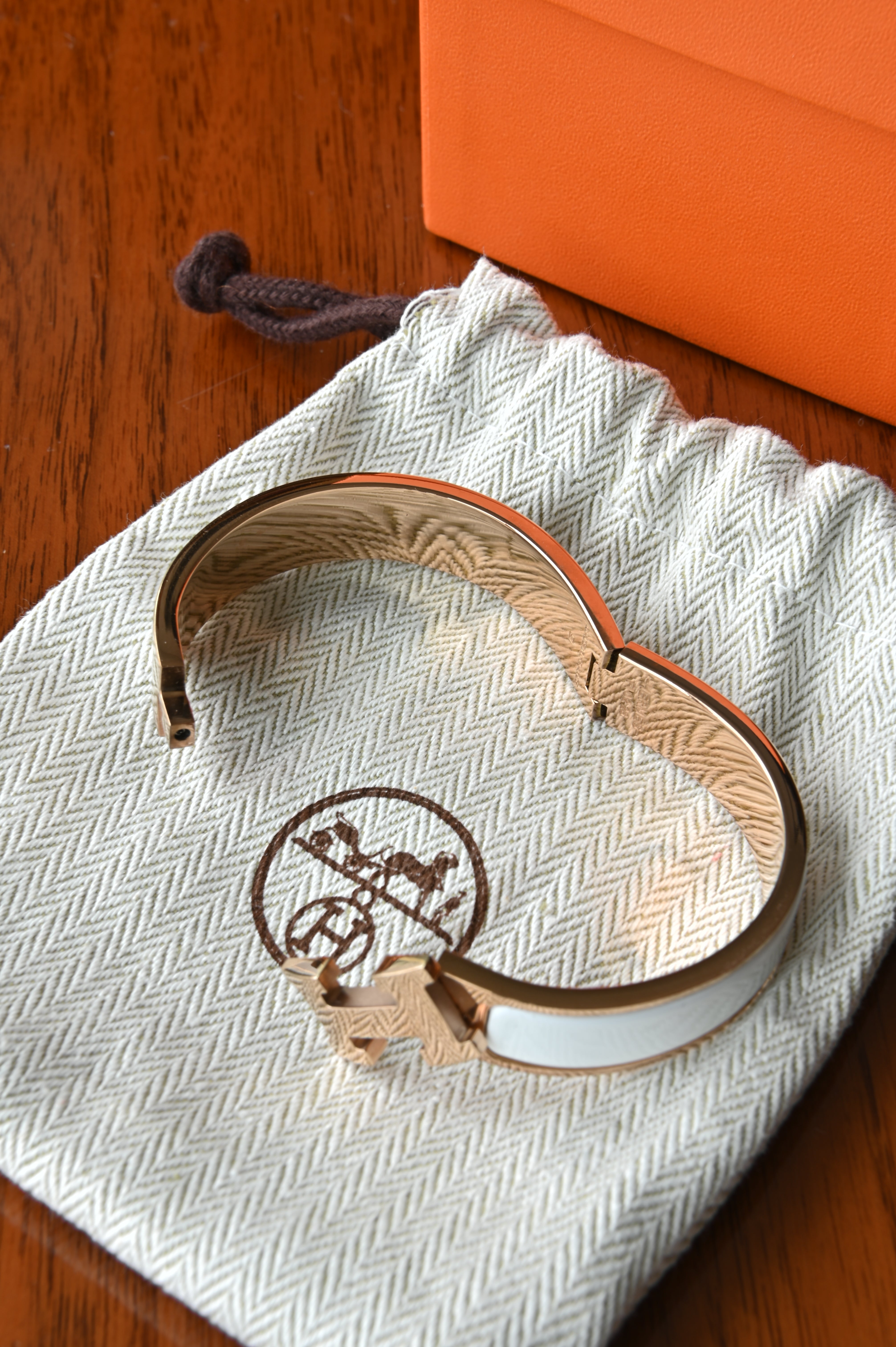 Hermès Clic H White Enamel Bracelet angle