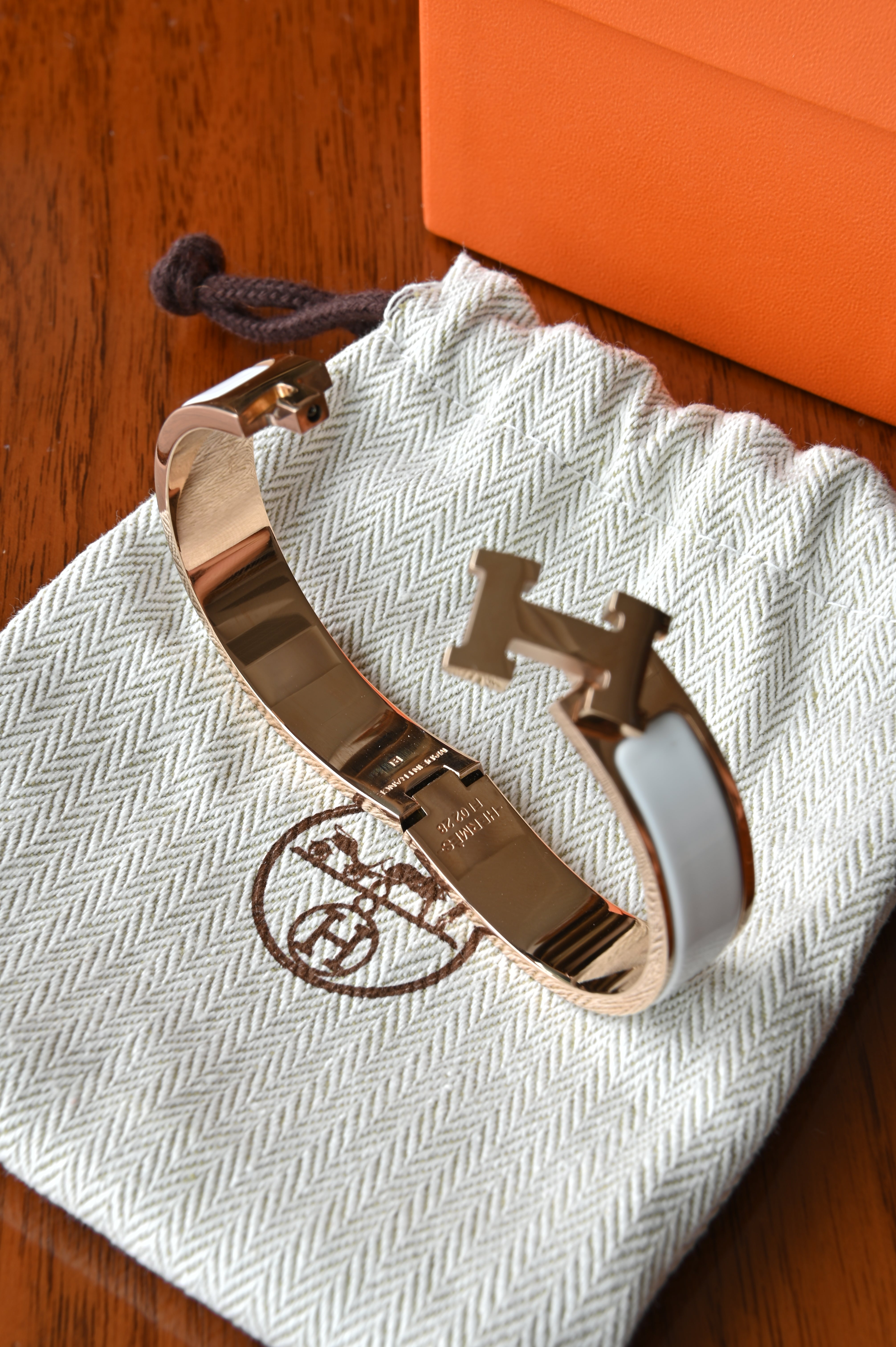 Hermès Clic H White Enamel Bracelet angle two