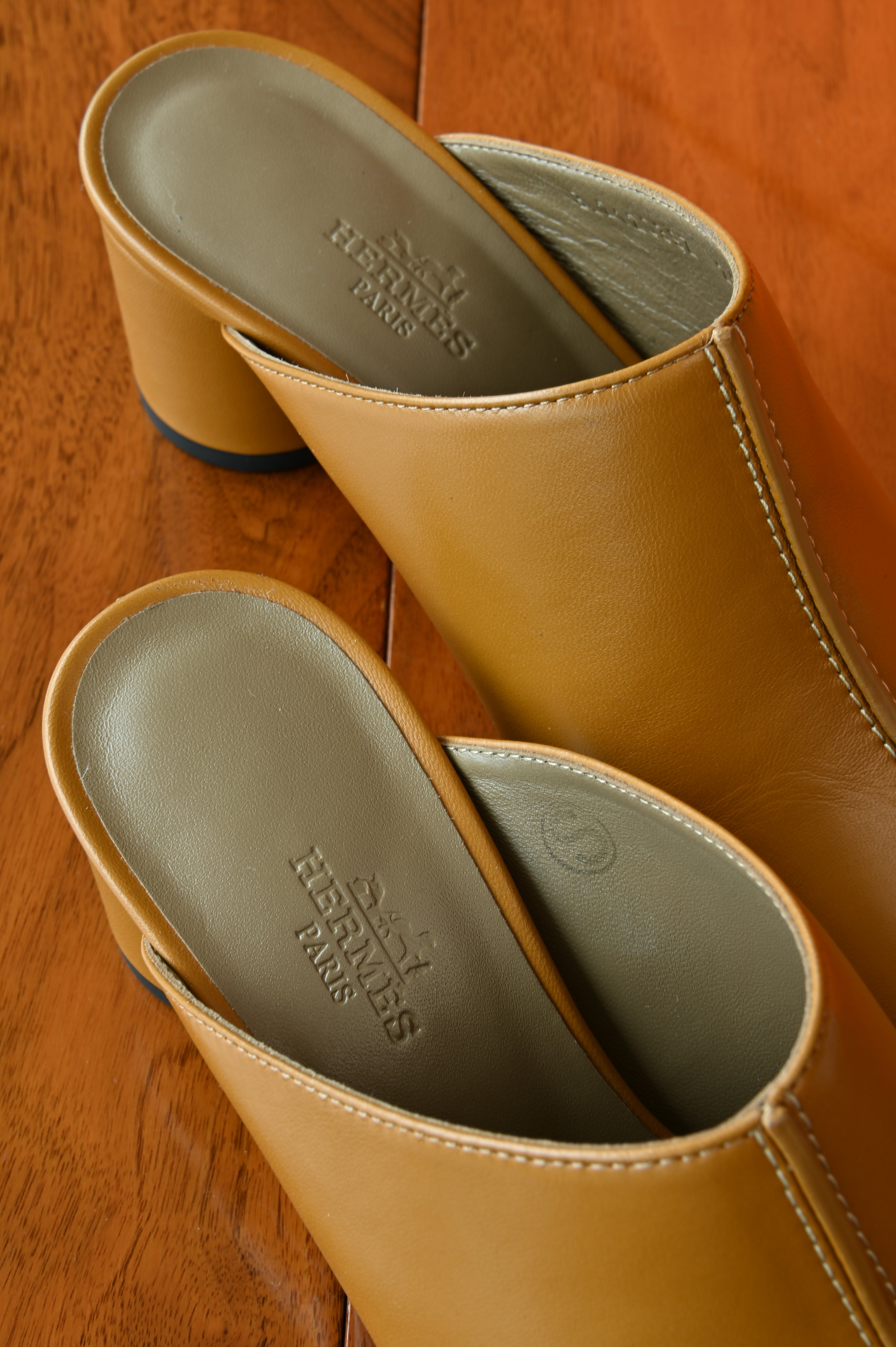 Hermes Mules Femme Detail in Beige Dore back