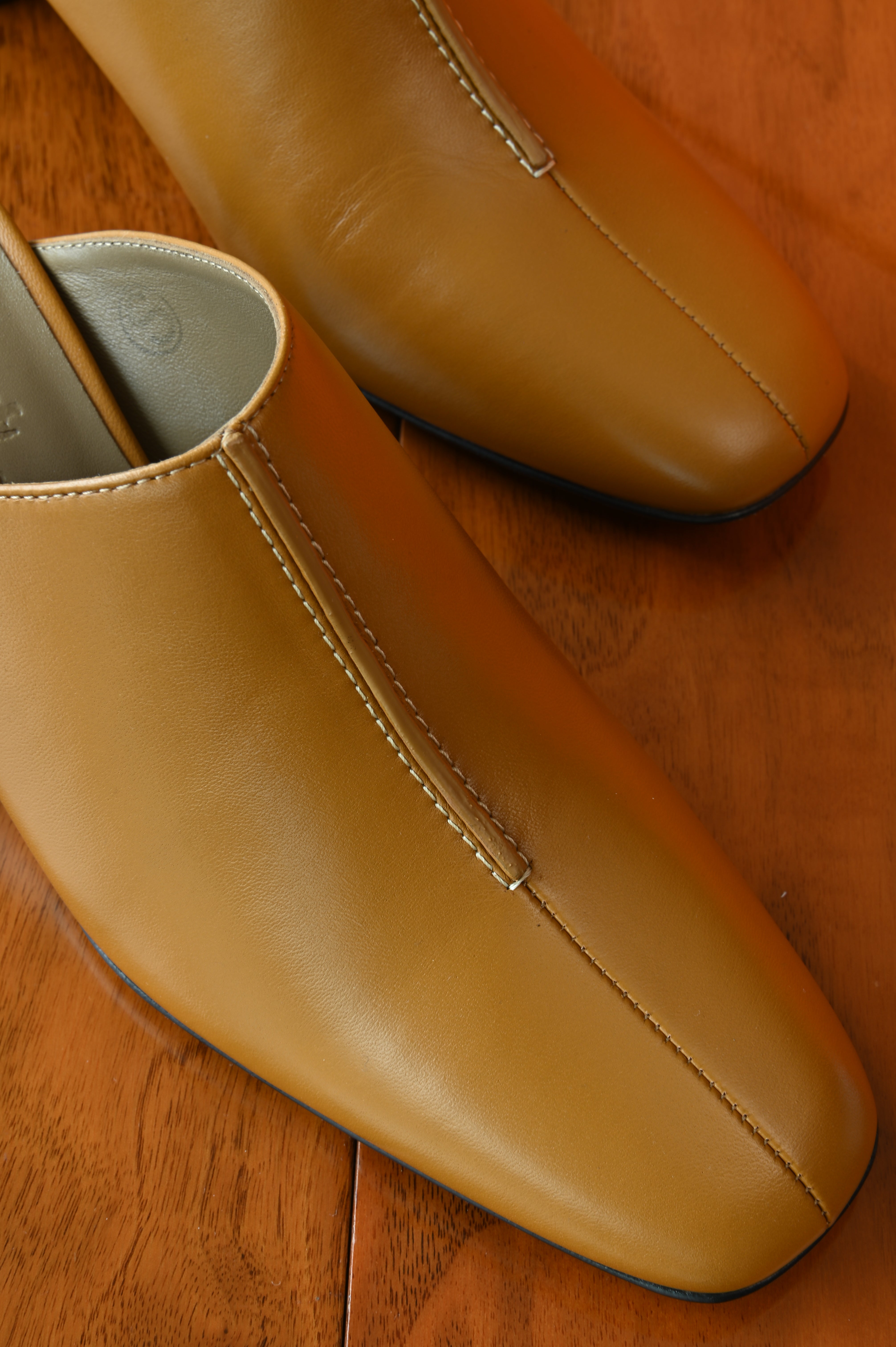 Hermes Mules Femme Detail in Beige Dore front