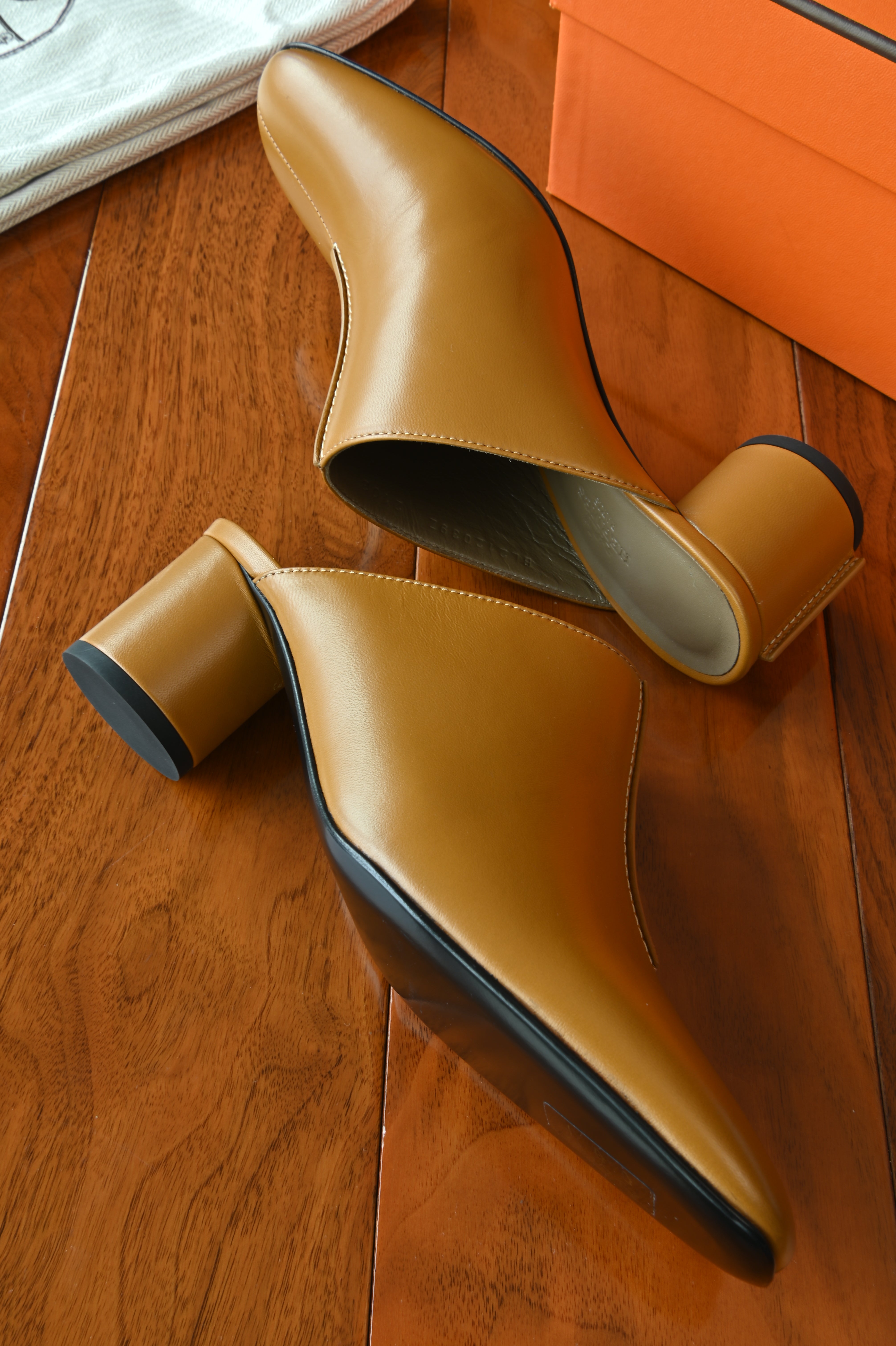 Hermes Mules Femme Detail in Beige Dore side