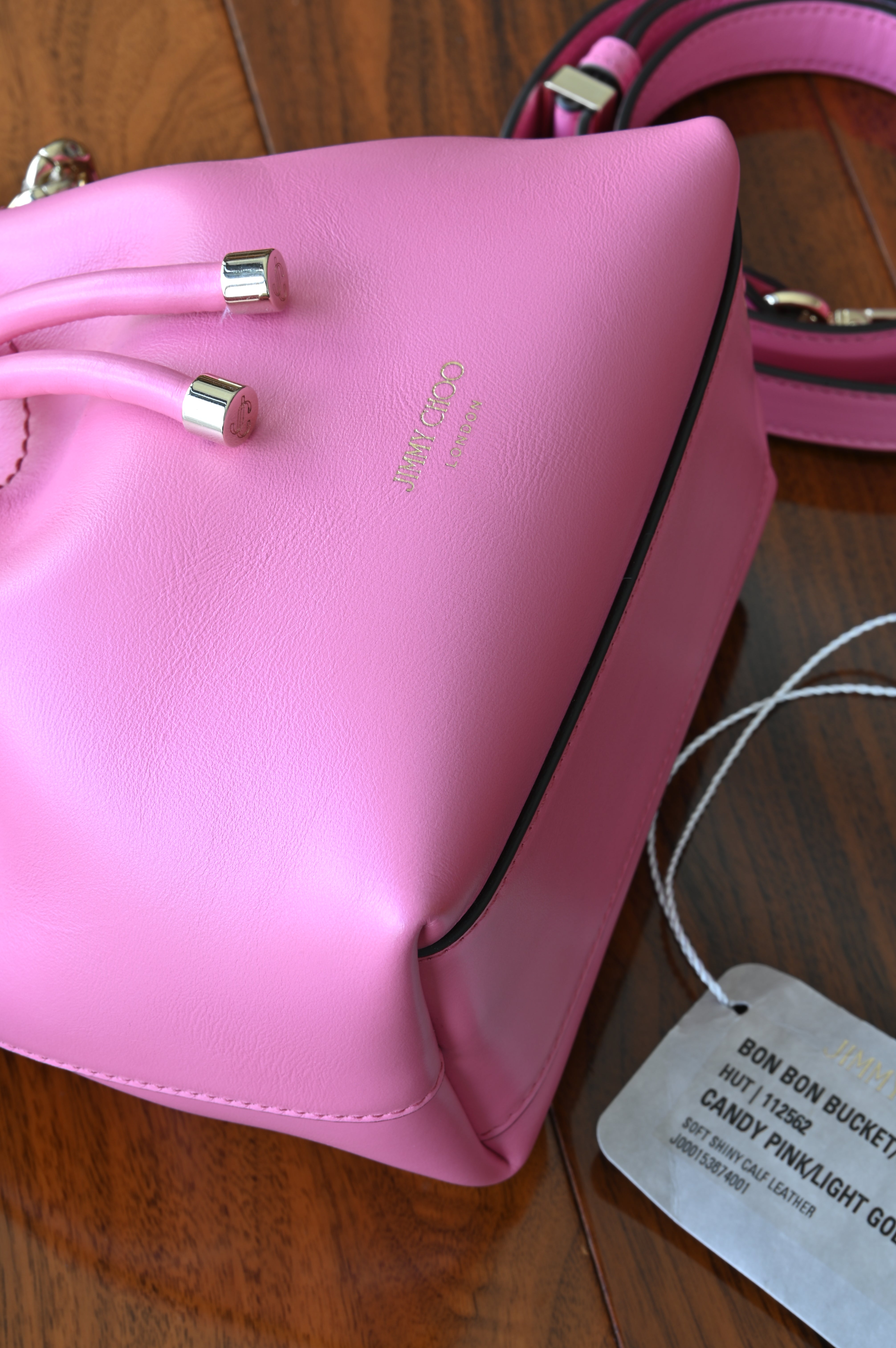 Jimmy Choo Pink Bon Bon Bucket Bag bottom angle