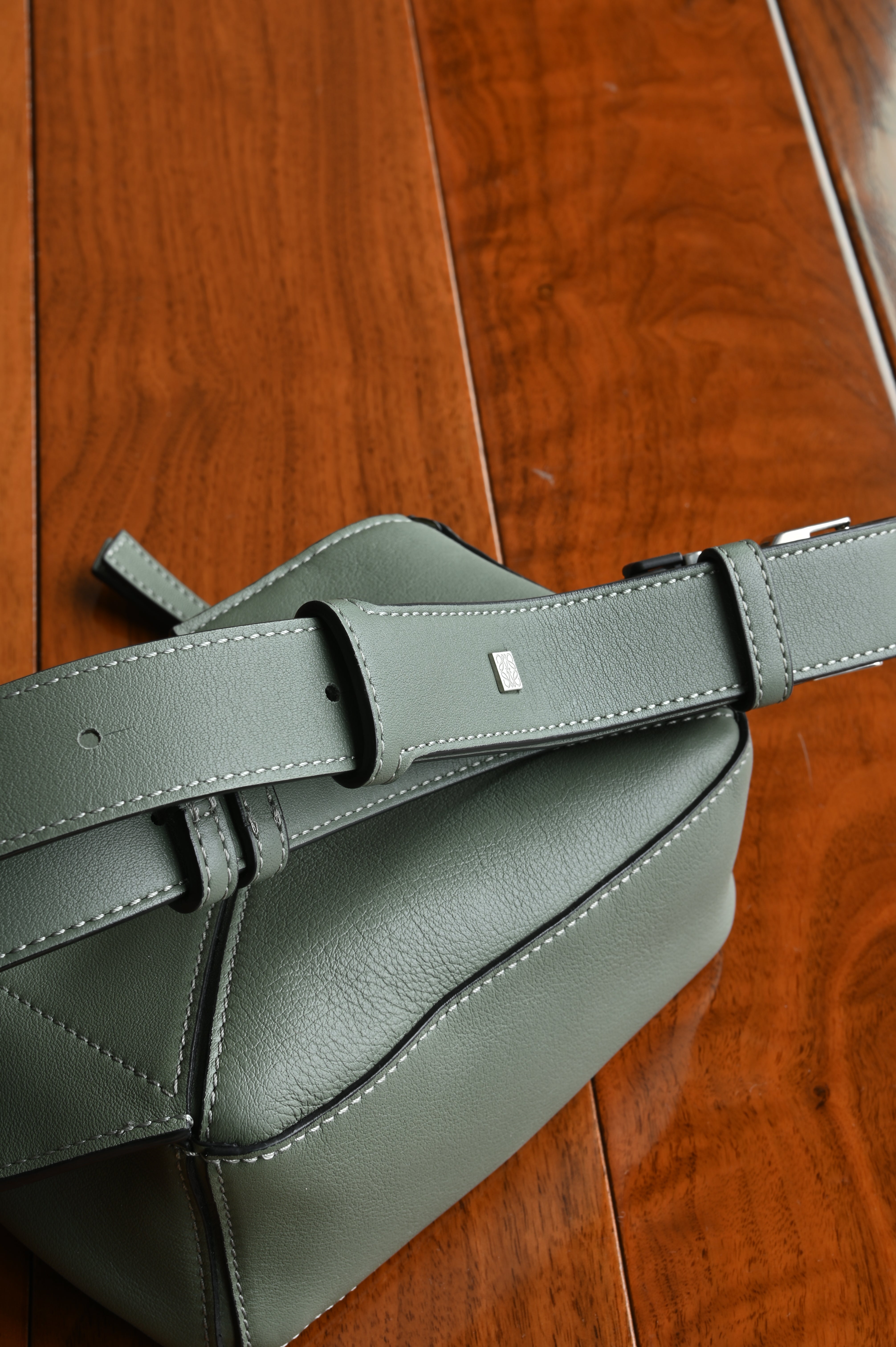 Loewe Sage Green Puzzle Edge Bag logo