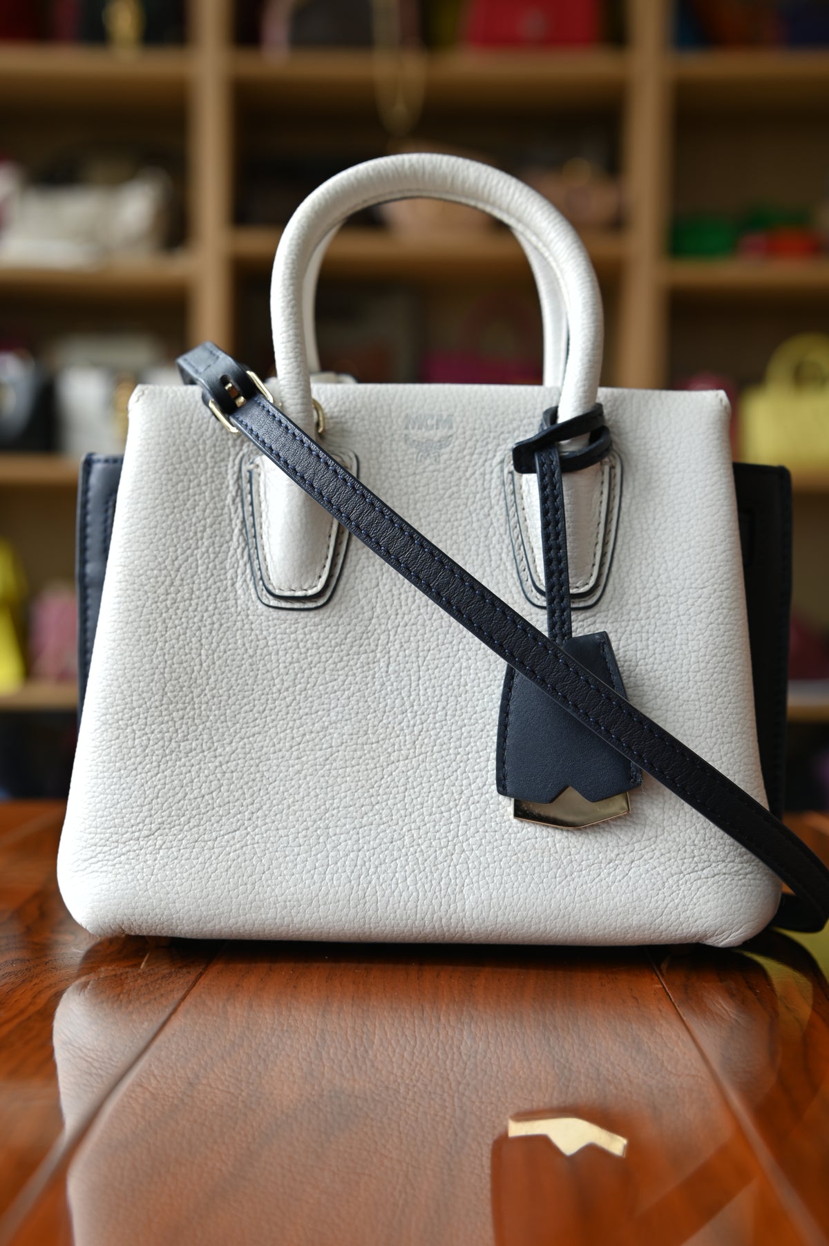 MCM White Navy Blue Grained Calf Top Handle Bag strap