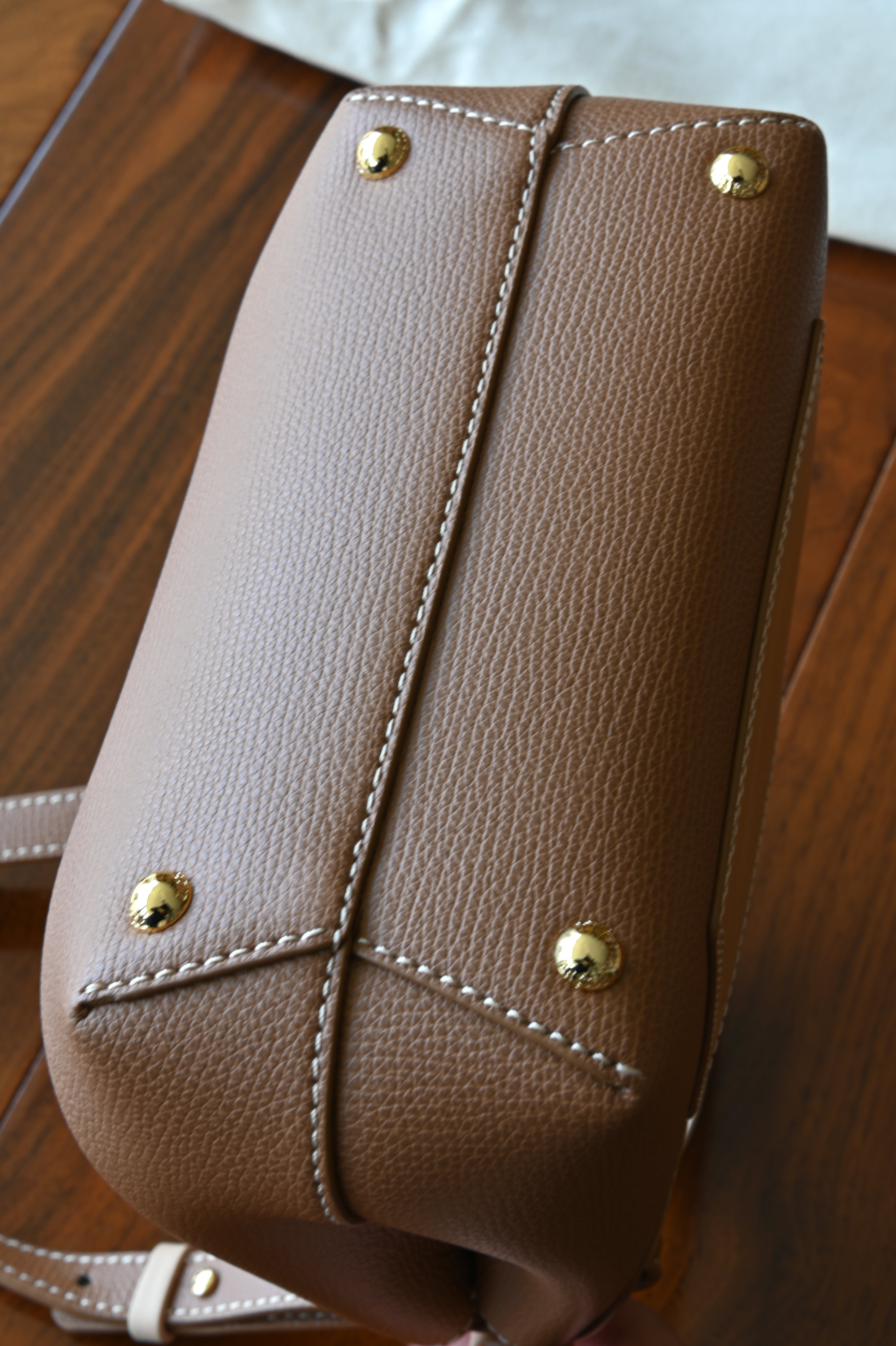 Authentic preloved Polène Numéro Un Nano Bag in Trio Camel, bottom view showcasing the leather base, structured silhouette, and overall condition.