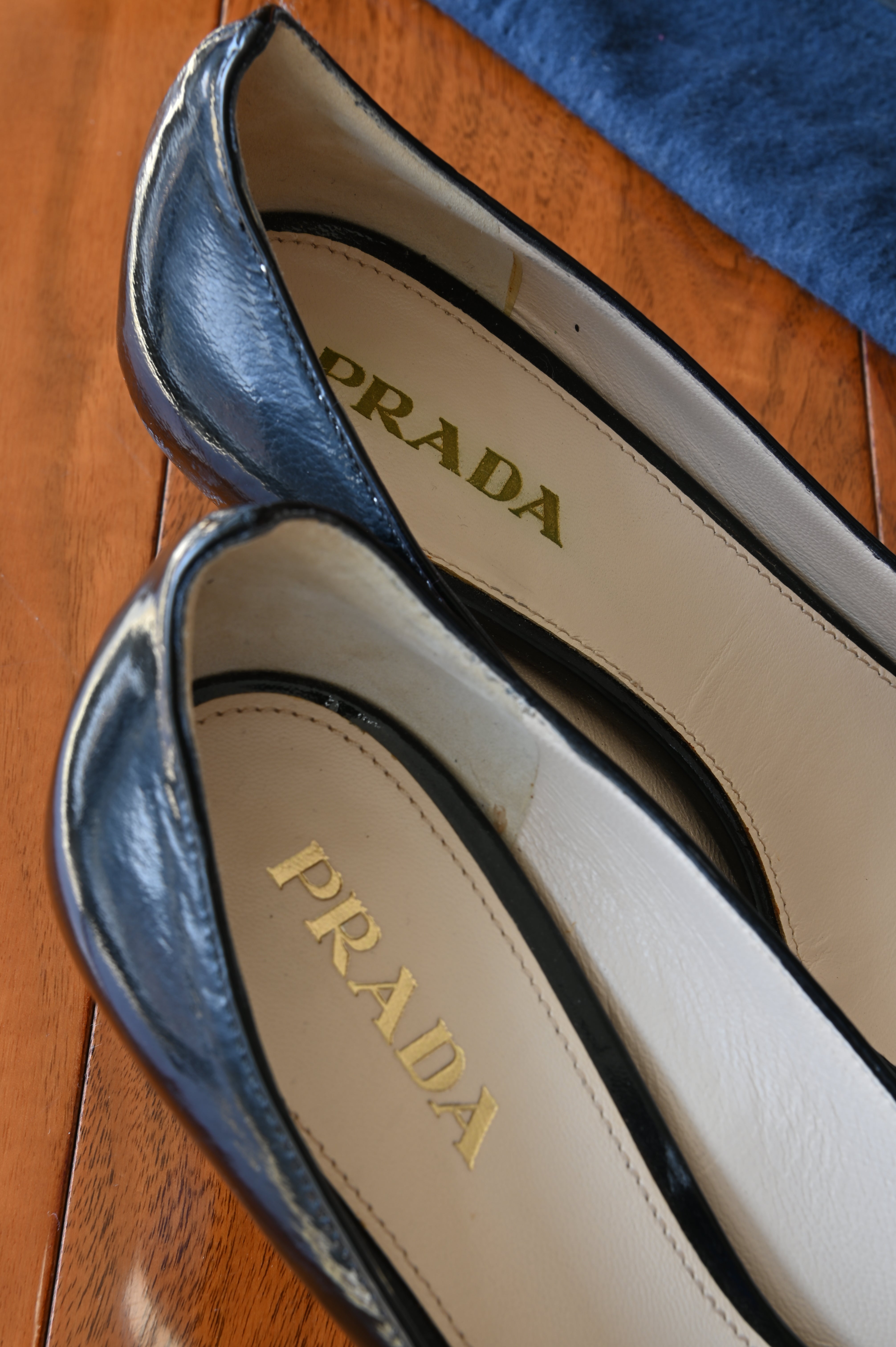 Prada Black Patent Heels logo