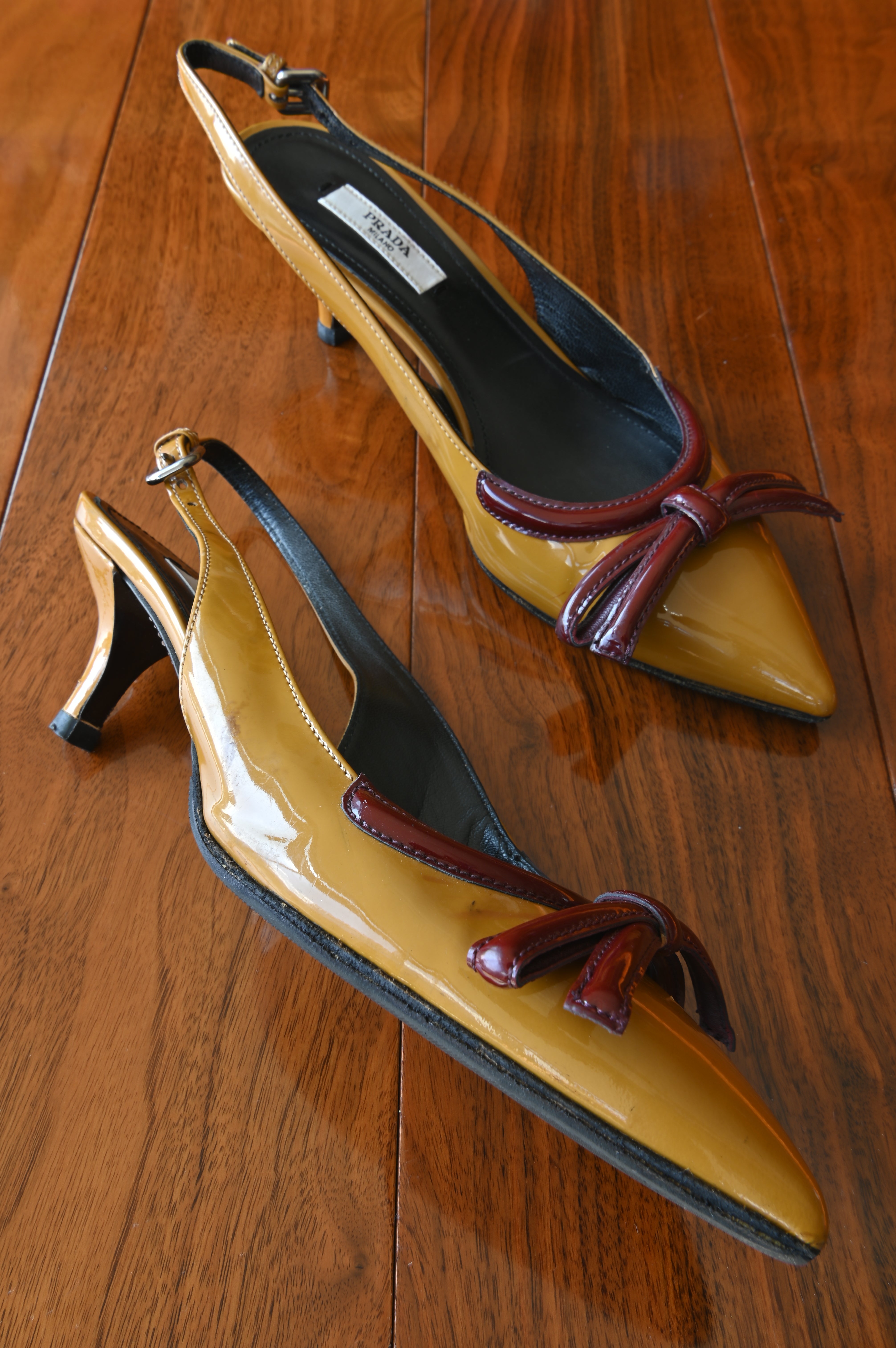 Prada Yellow Red Patent Bow Heels left
