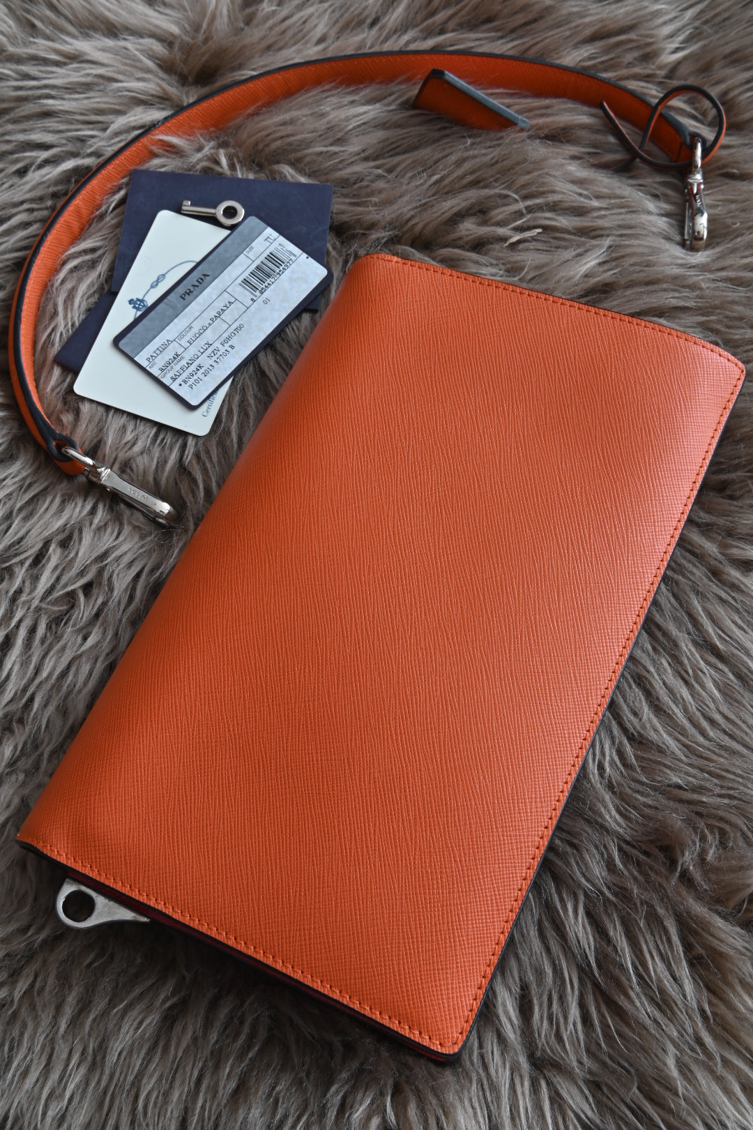 Prada two-way clutch bag Saffiano Lux in Fuoco Papaya back