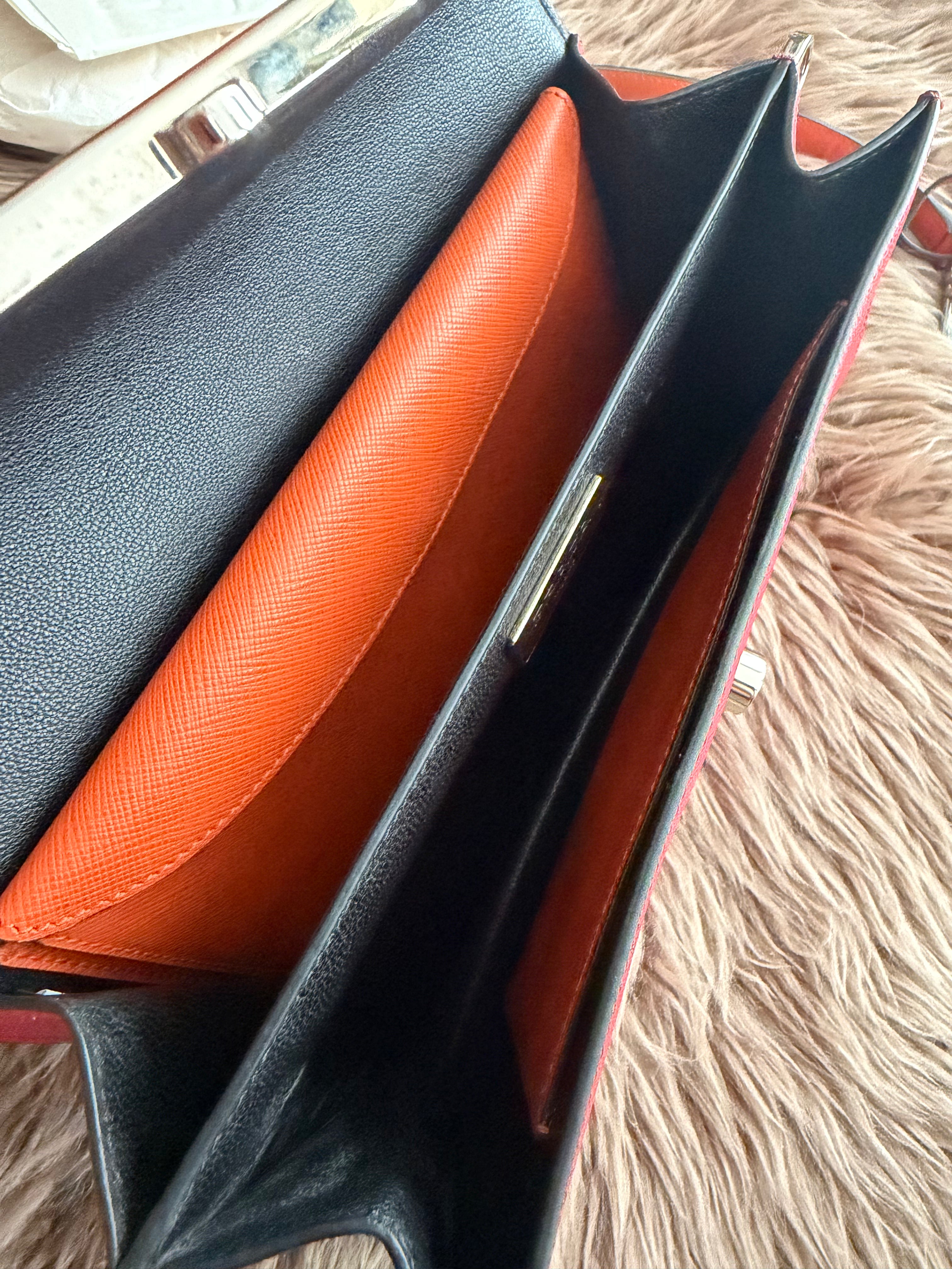 Prada two-way clutch bag Saffiano Lux in Fuoco Papaya inside