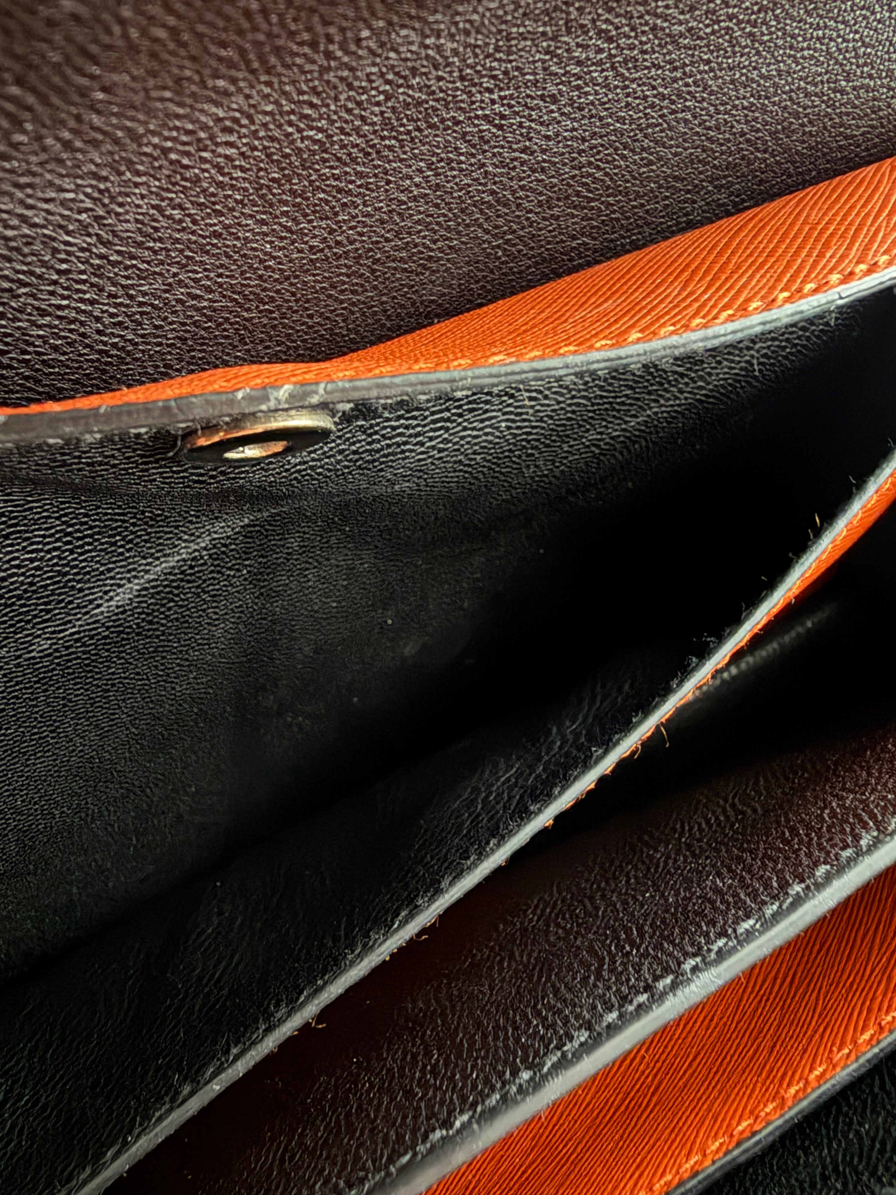 Prada two-way clutch bag Saffiano Lux in Fuoco Papaya pocket