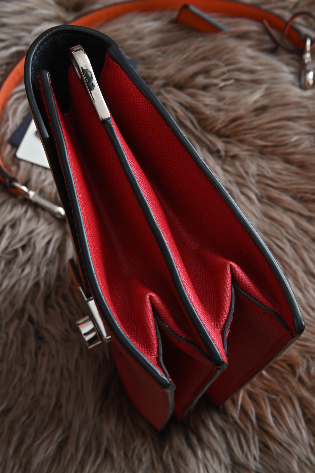 Prada two-way clutch bag Saffiano Lux in Fuoco Papaya right