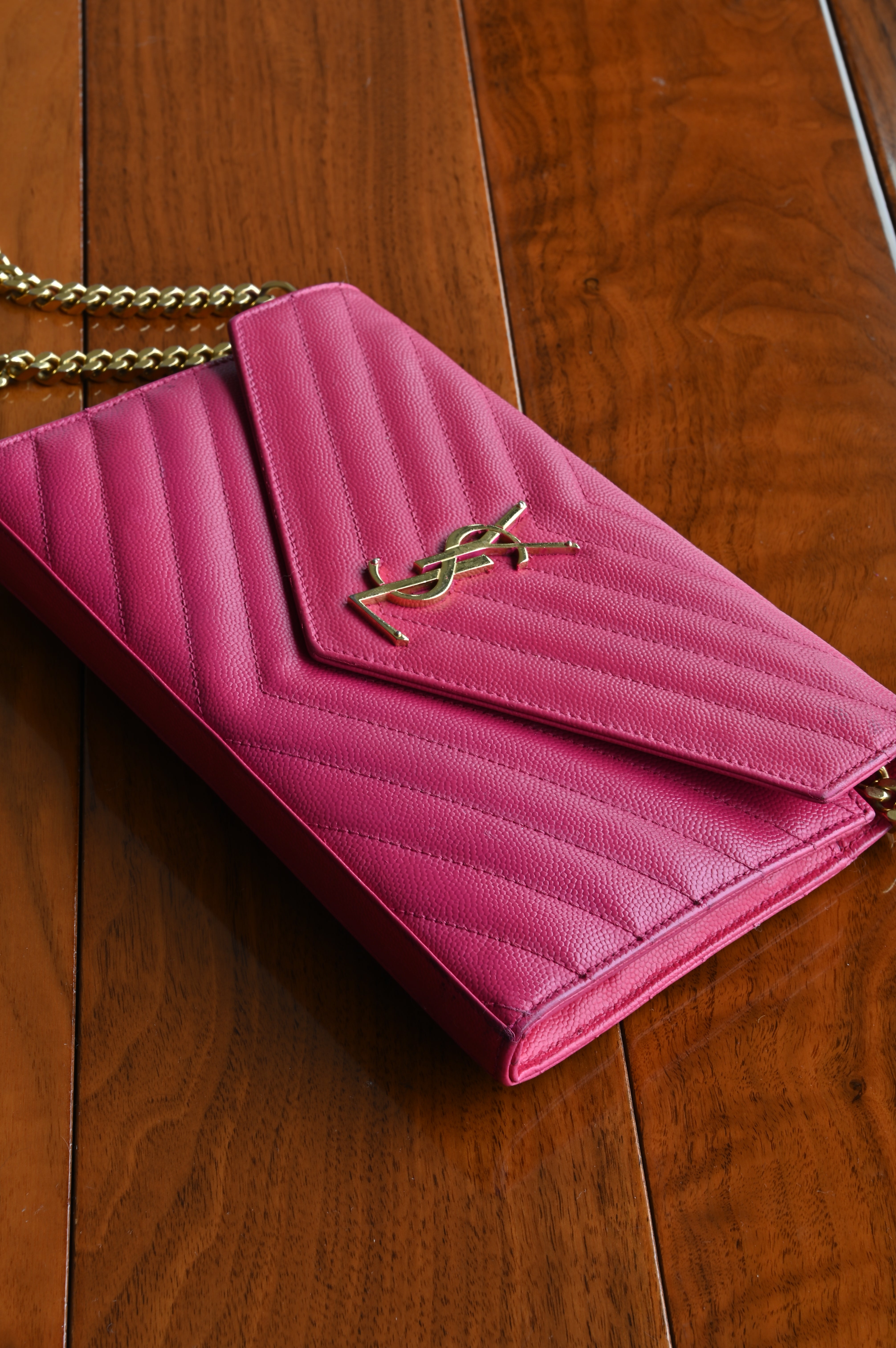 SAINT LAURENT Pink Cassandre Envelope Chain Wallet in Lambskin angle
