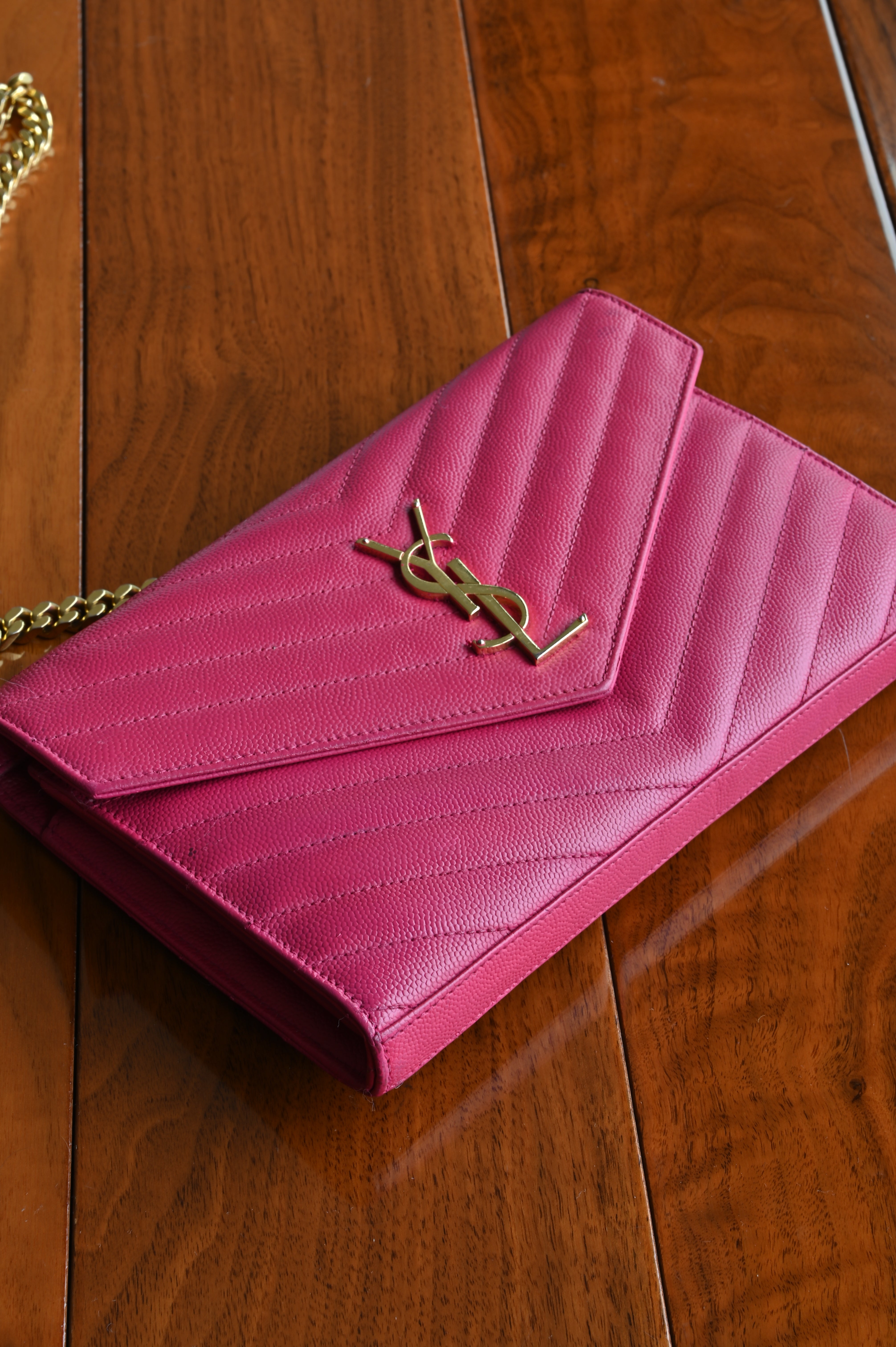 SAINT LAURENT Pink Cassandre Envelope Chain Wallet in Lambskin front two