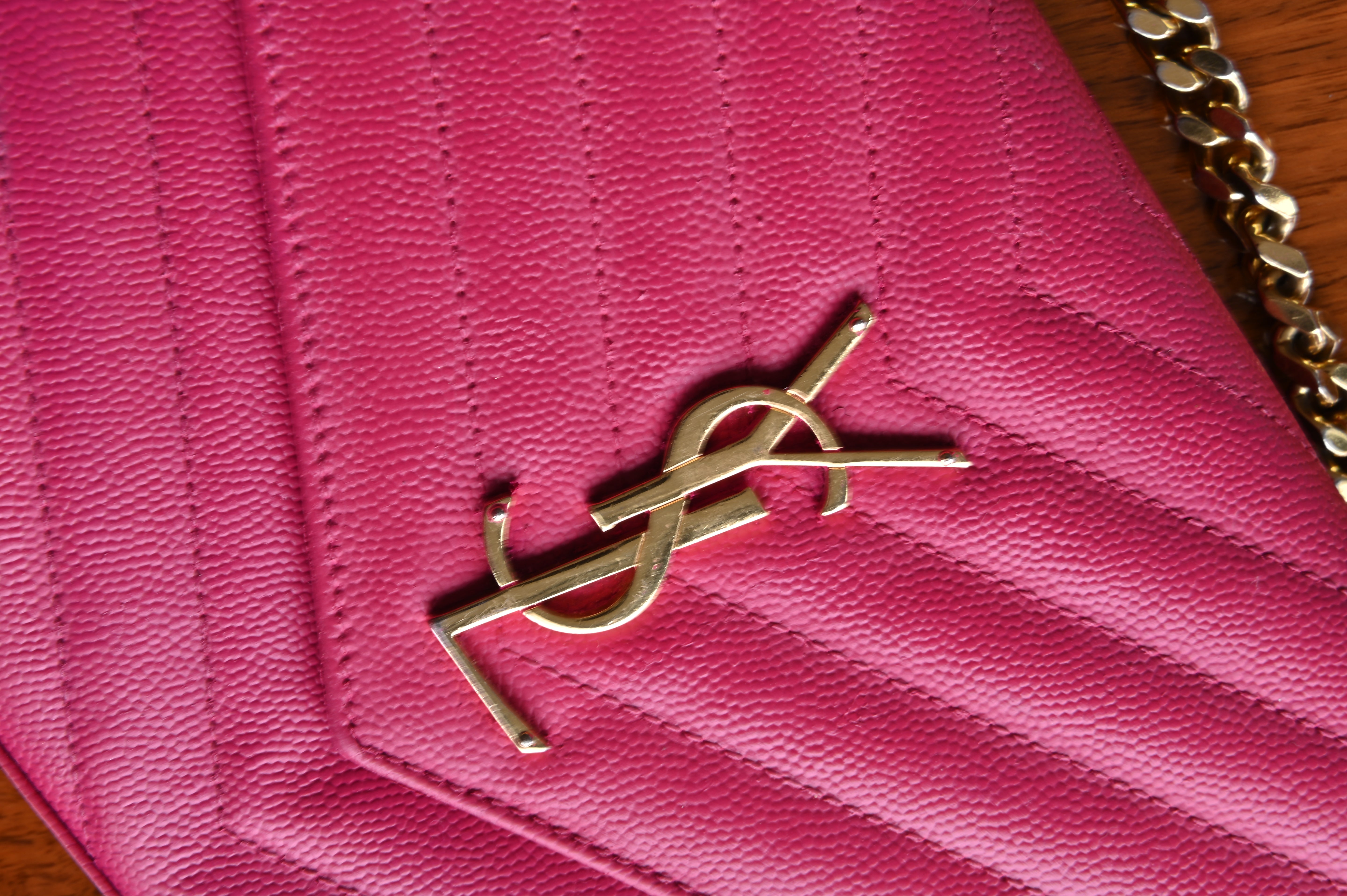 SAINT LAURENT Pink Cassandre Envelope Chain Wallet in Lambskin logo