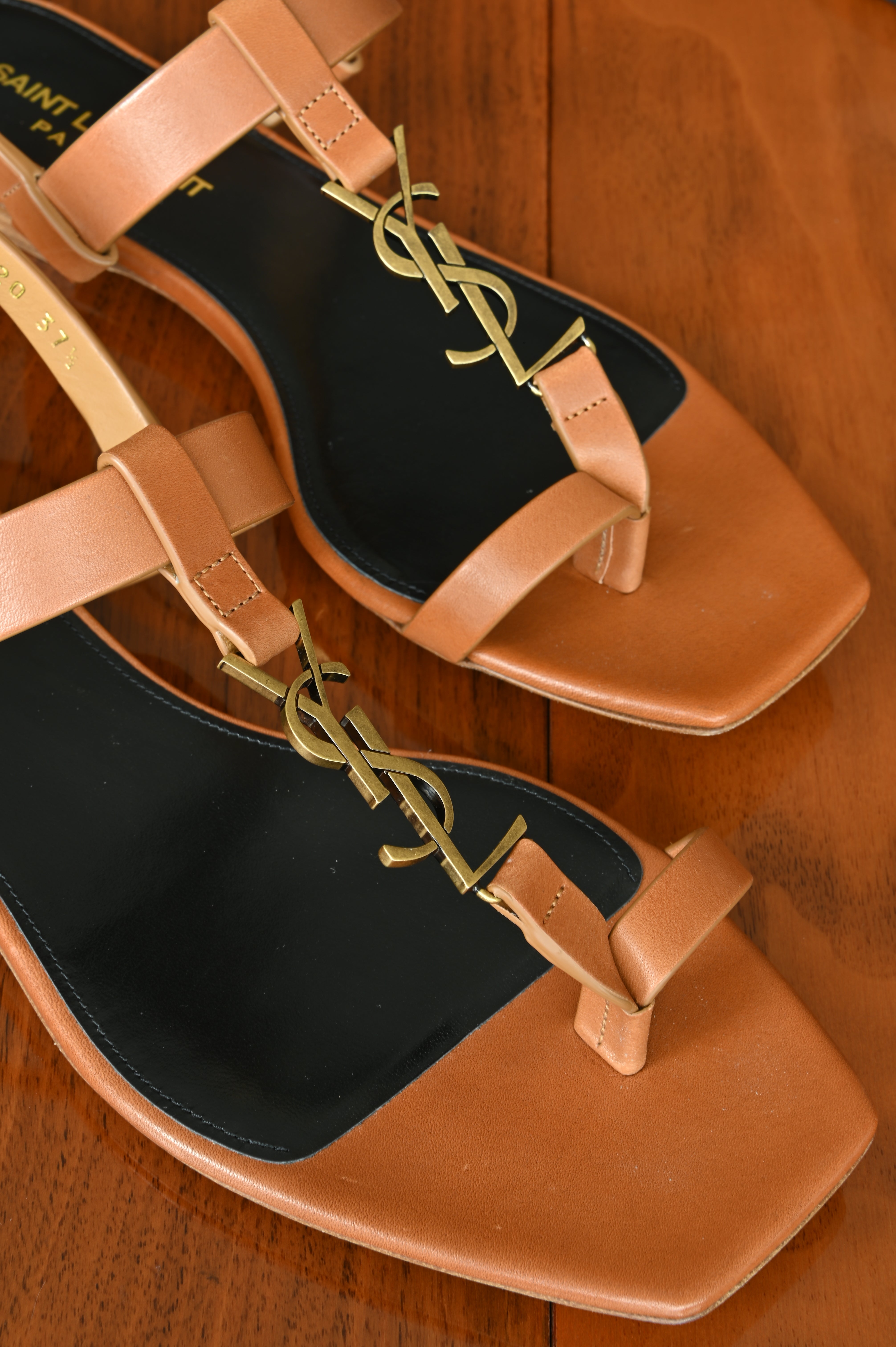 Saint Laurent Brown Cassandra Flat Thong Sandals logo