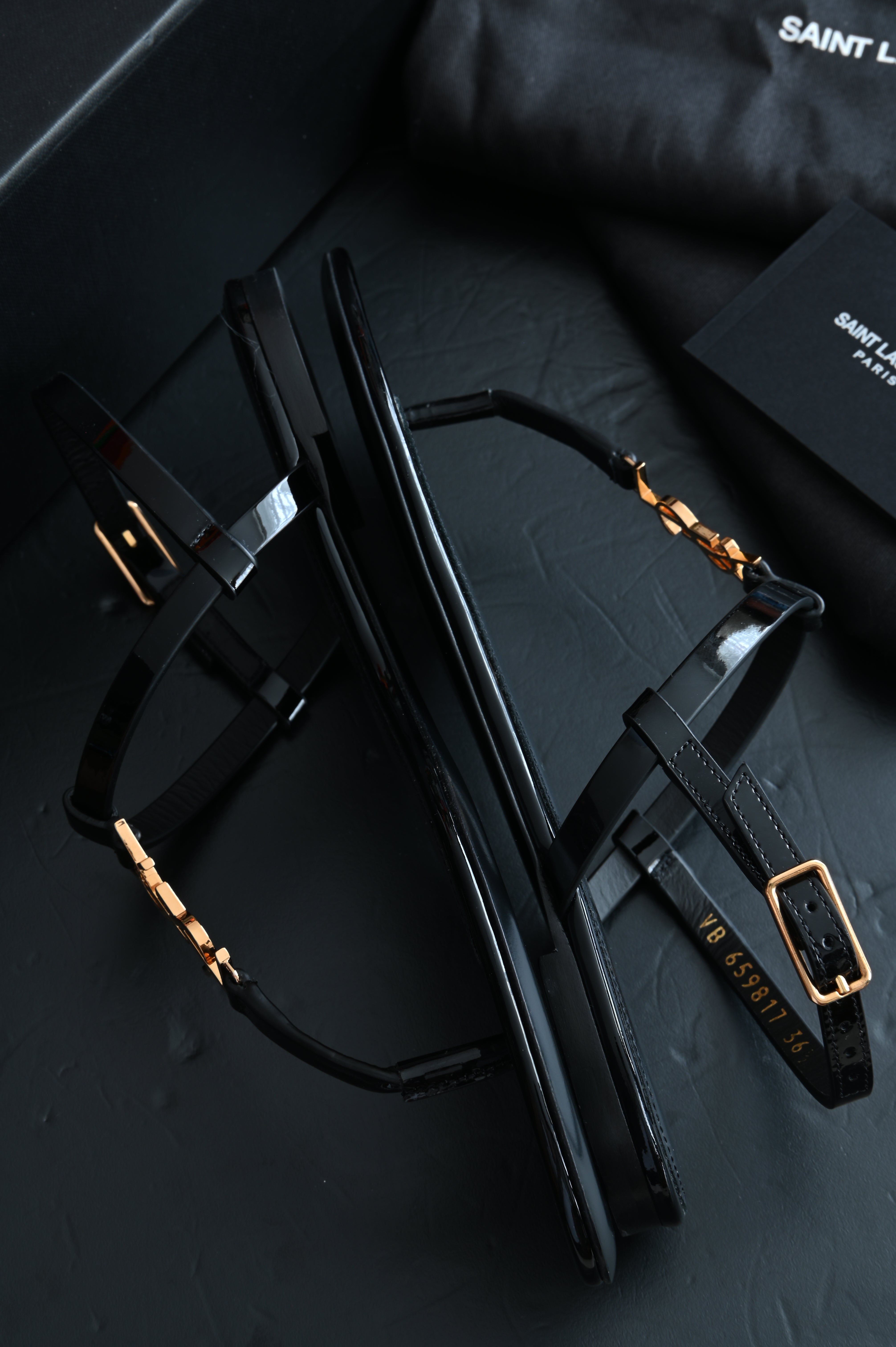 Saint Laurent Cassandra Thong sandals flats in patent and gold hardware