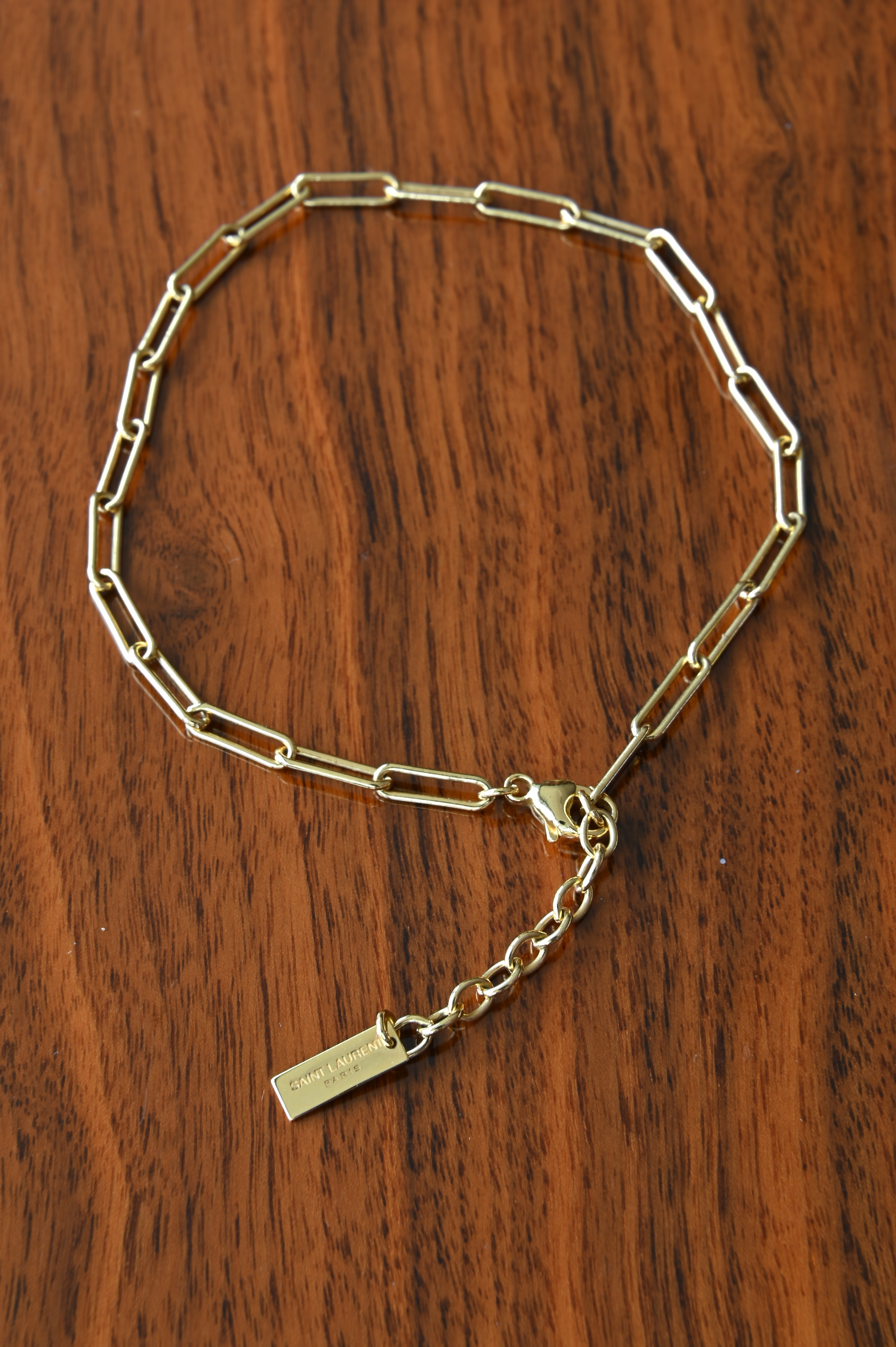 Saint Laurent Gold Metal Chain Bracelet angle