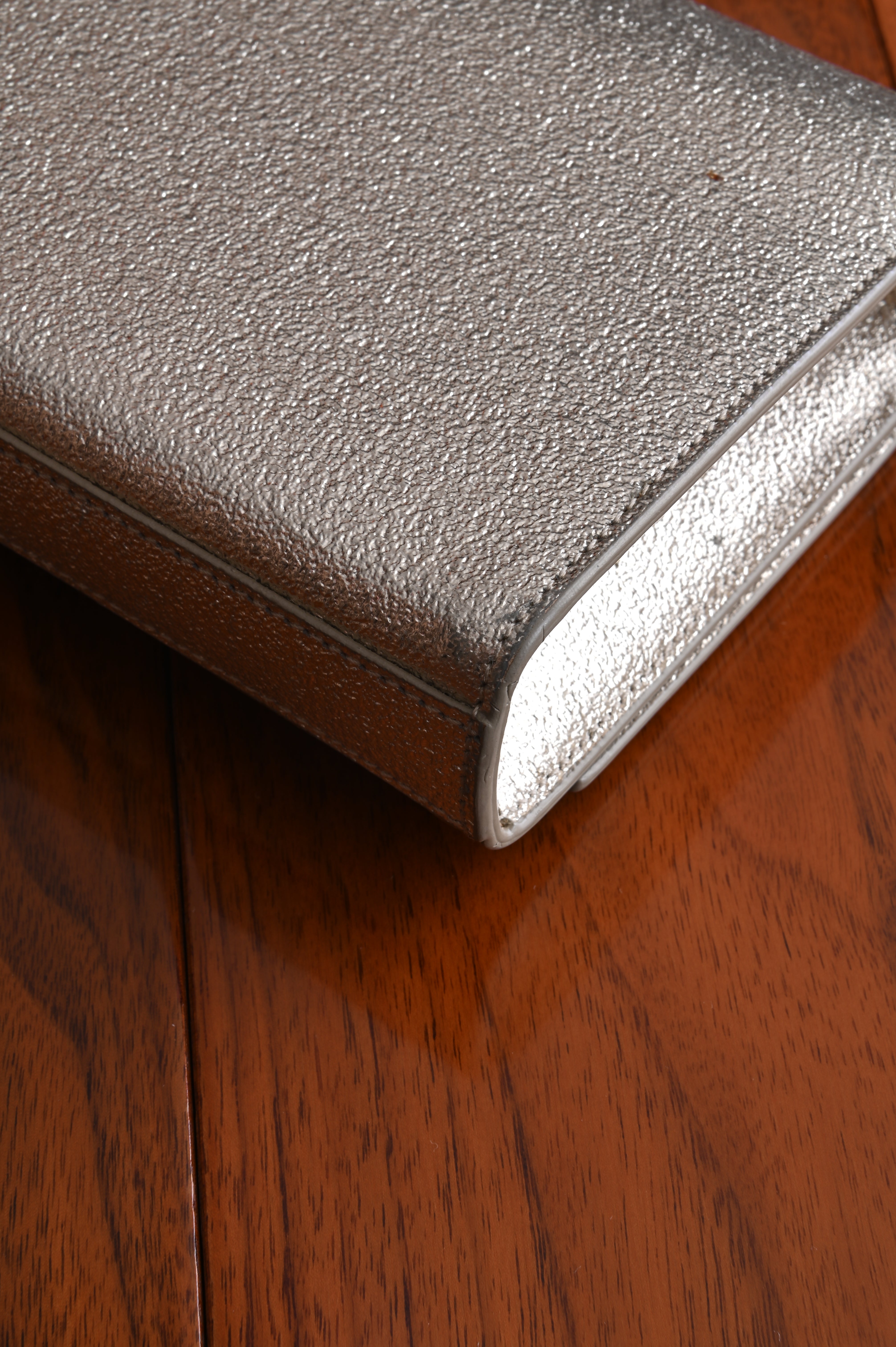 Saint Laurent Metallic Gold clutch back corner two