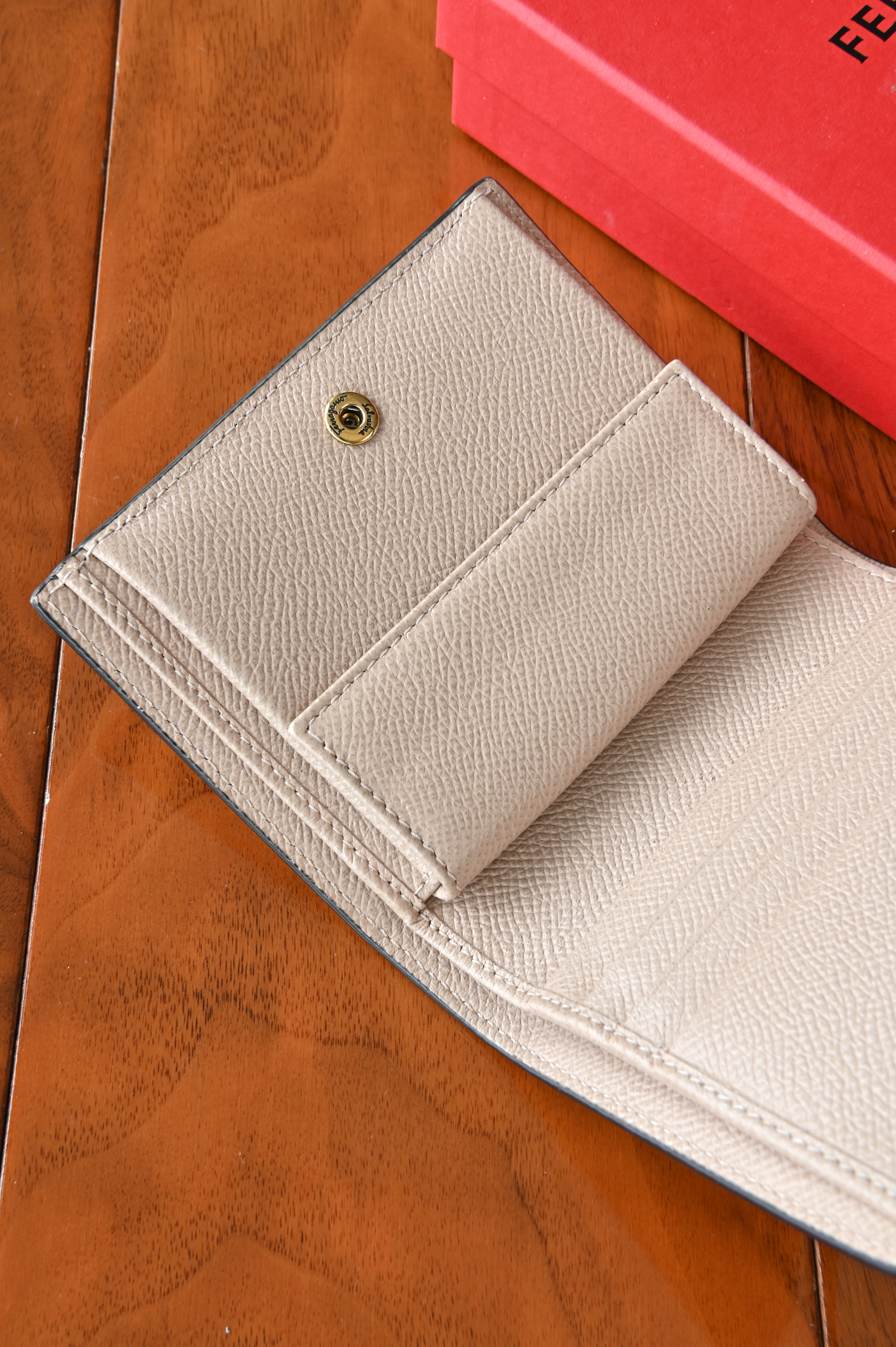 Salvatore Ferragamo Beige Gancini Compact Wallet clasp
