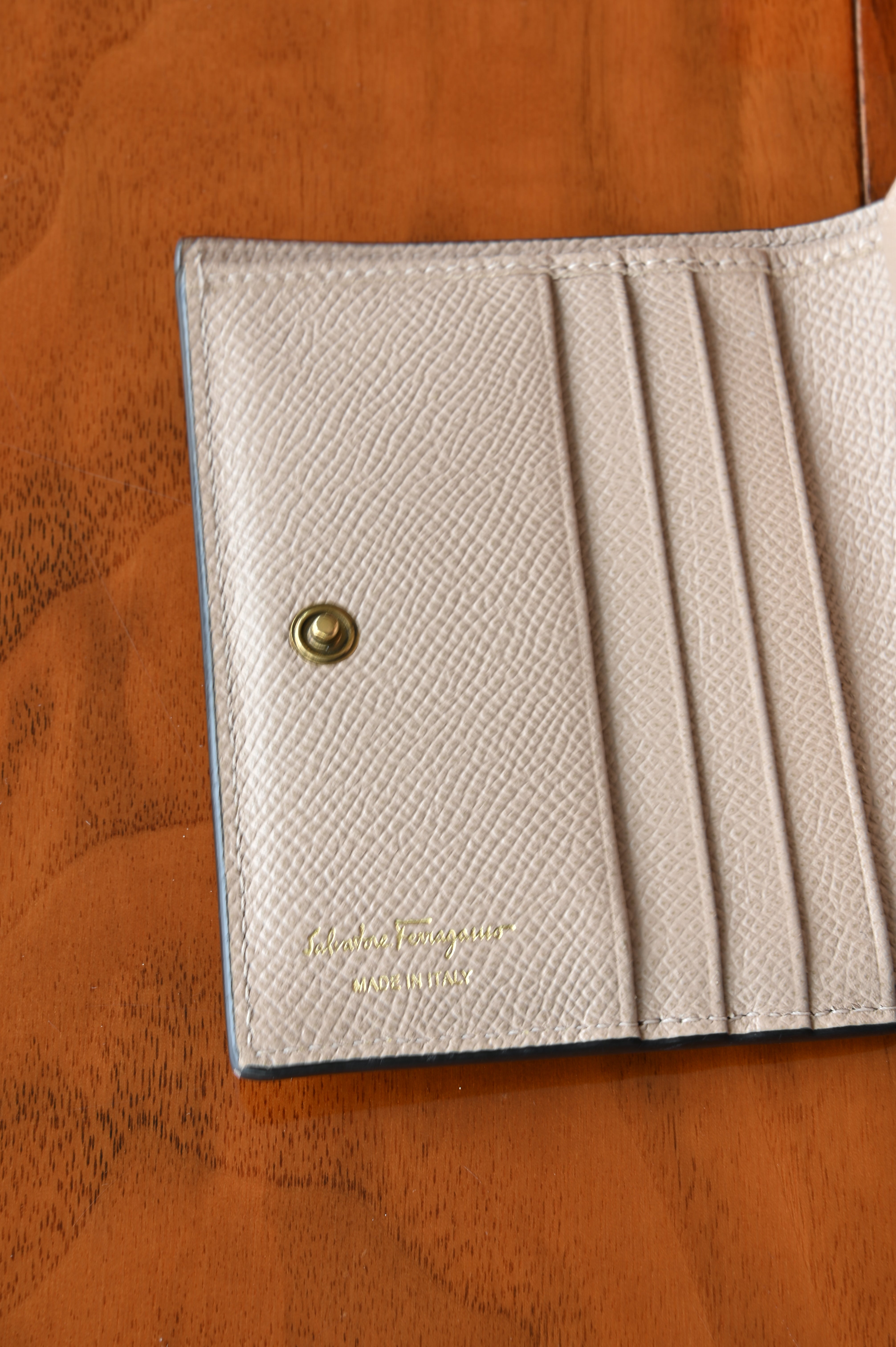 Salvatore Ferragamo Beige Gancini Compact Wallet engrave