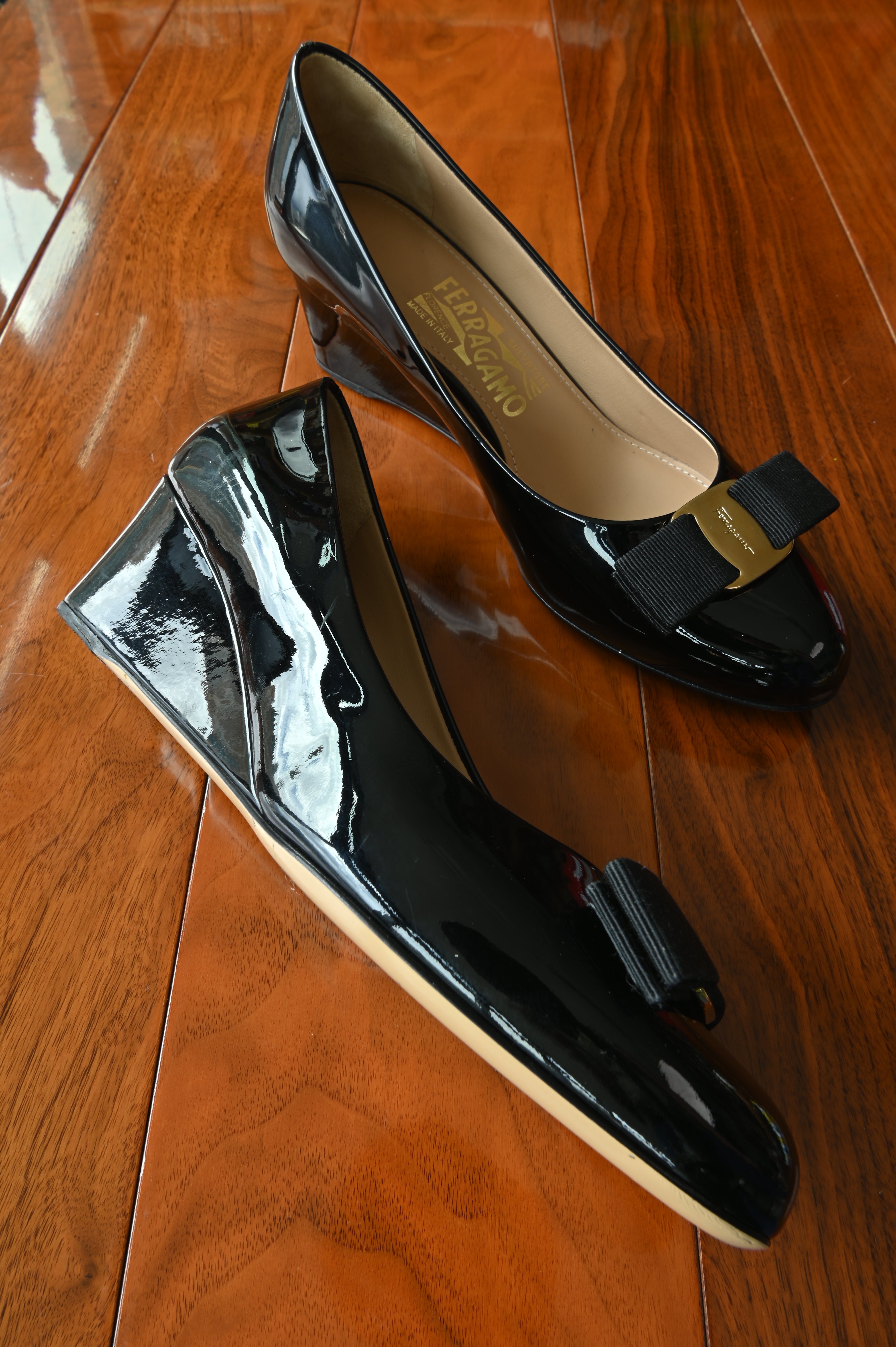 Salvatore Ferragamo Black Patent Pumps left