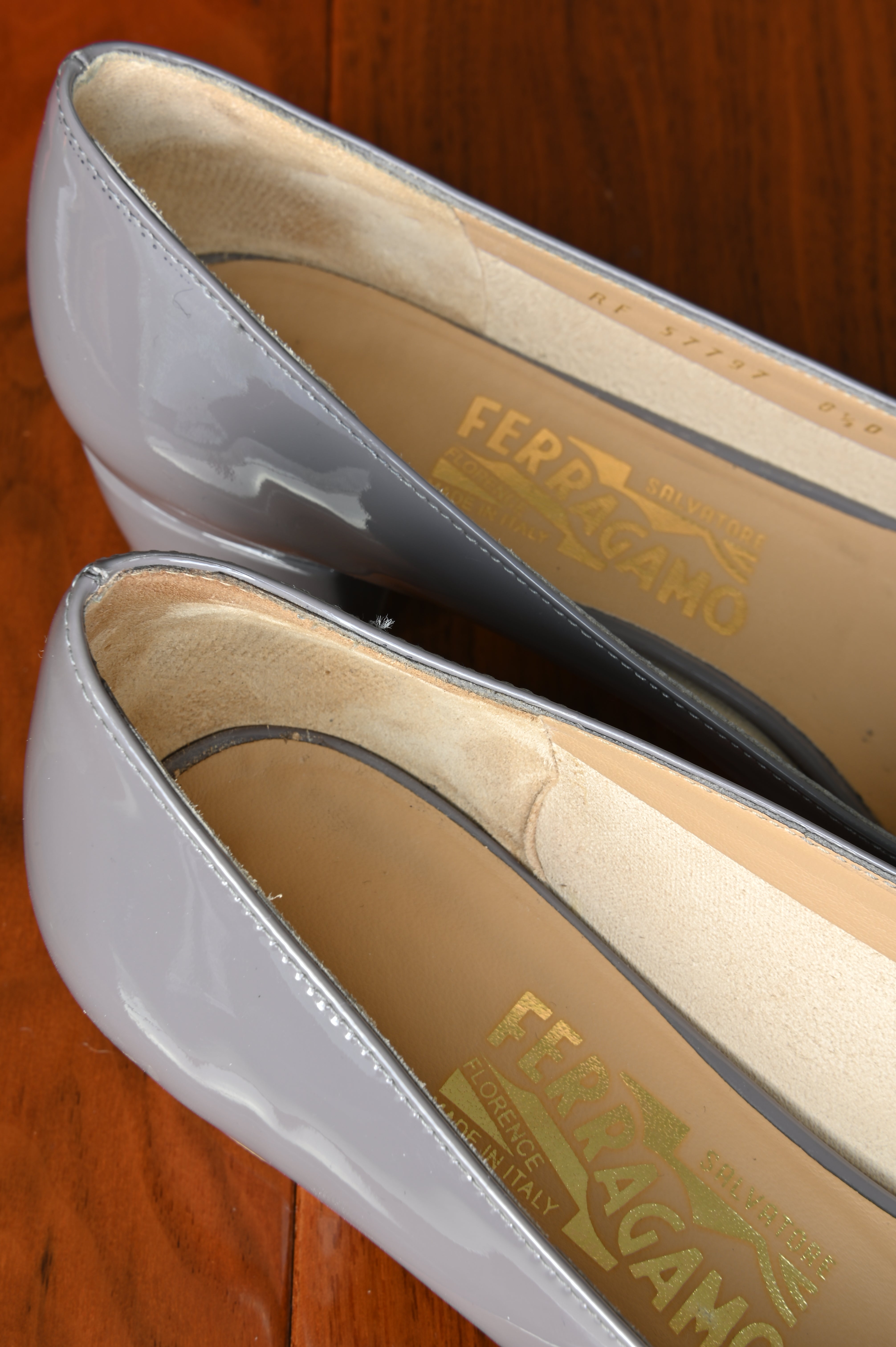Salvatore Ferragamo Grey Vara Pumps logo