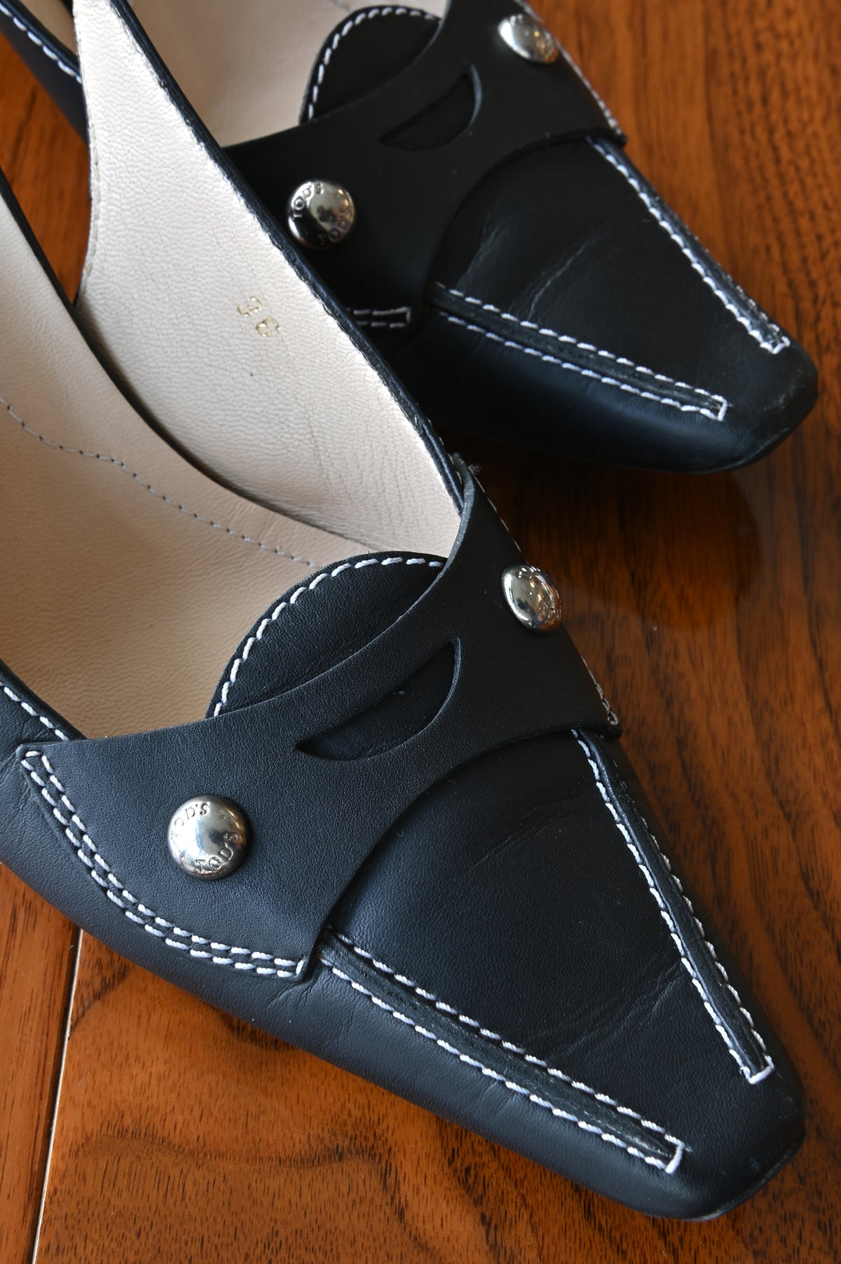 Tod's Black Leather Pointed Slingback Heels front