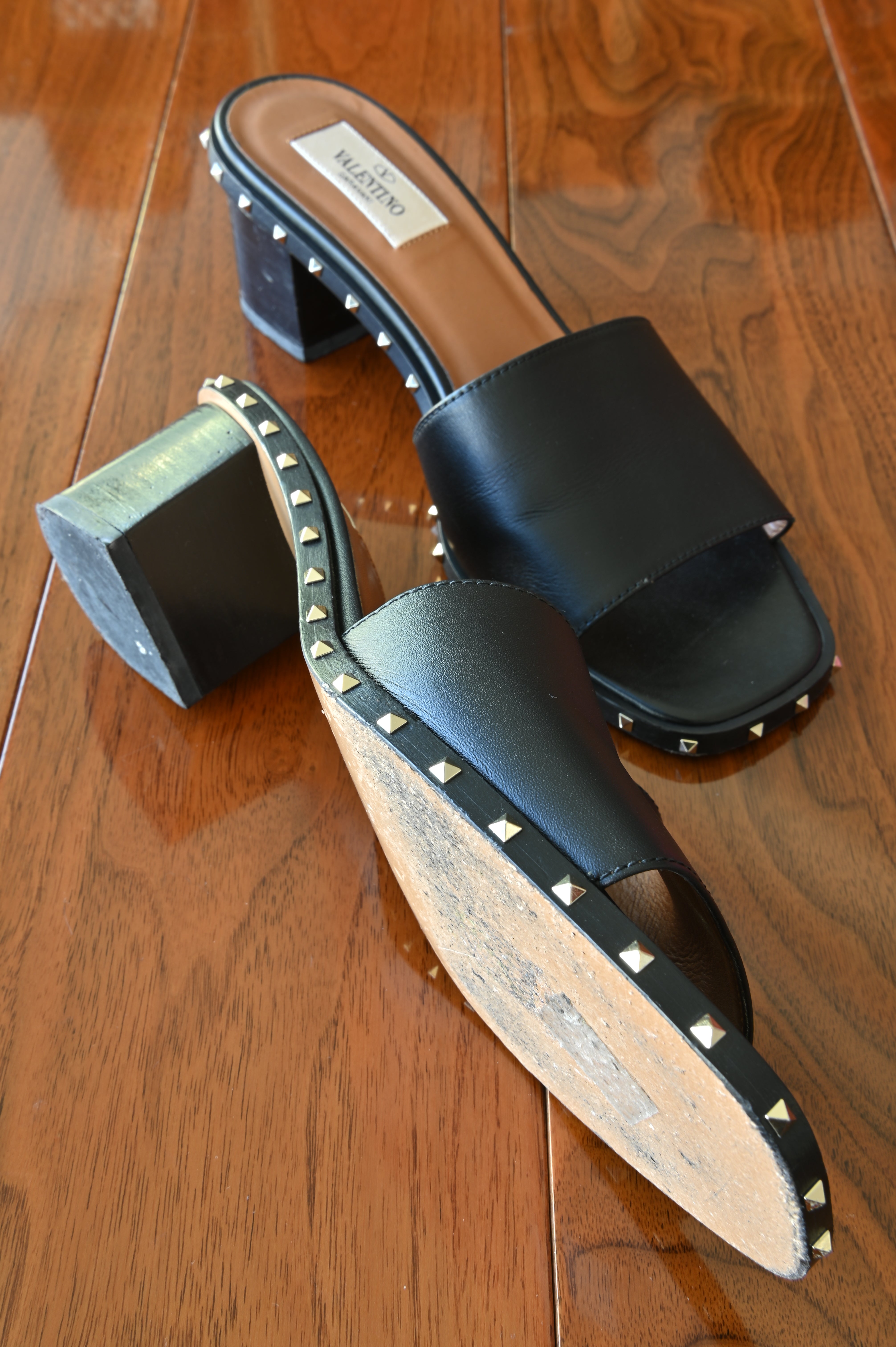 Valentino Garavani Black Rockstud Sandals left