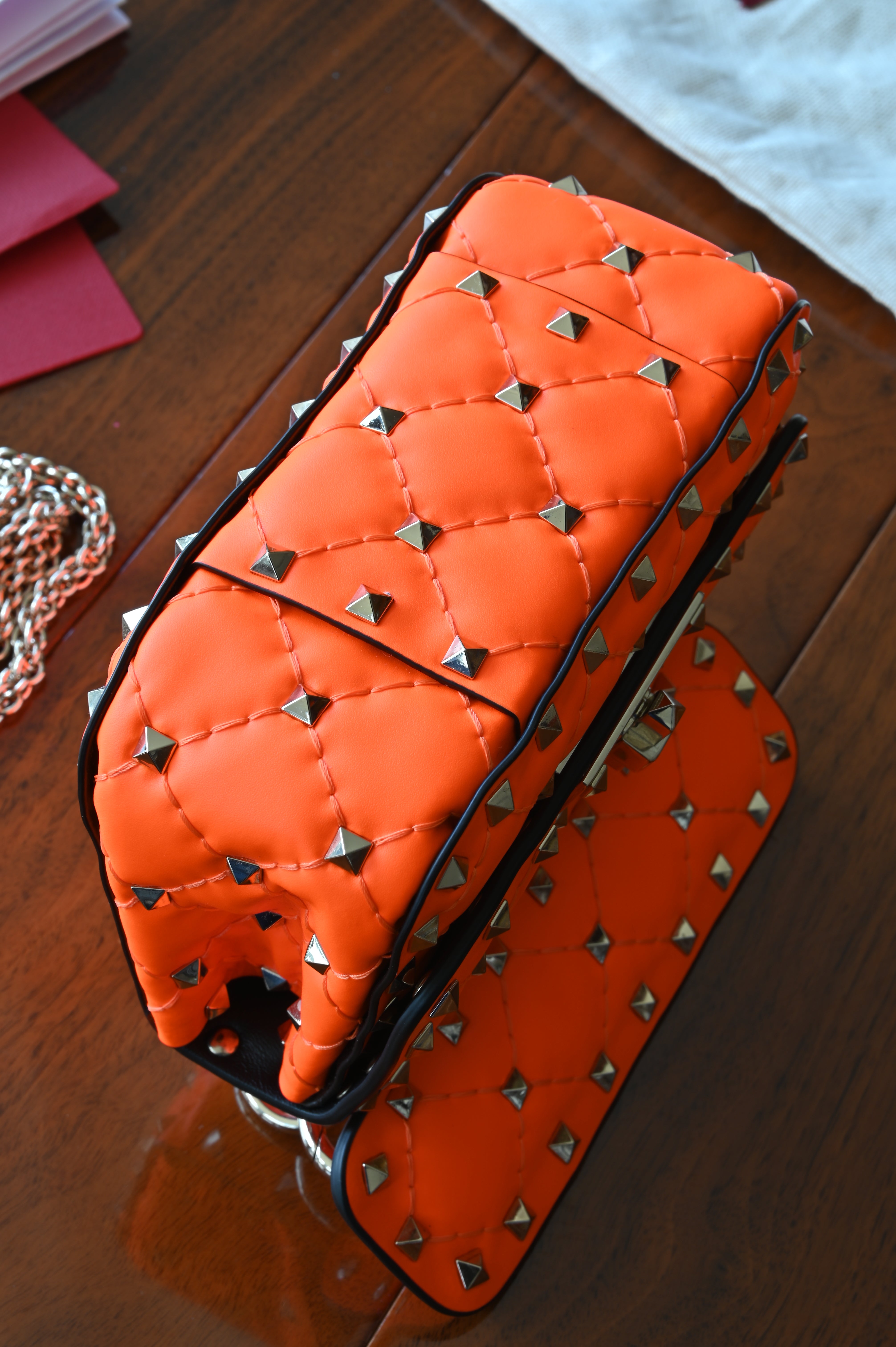 Valentino Garavani Mini Orange Rockstud Shoulder Bag bottom