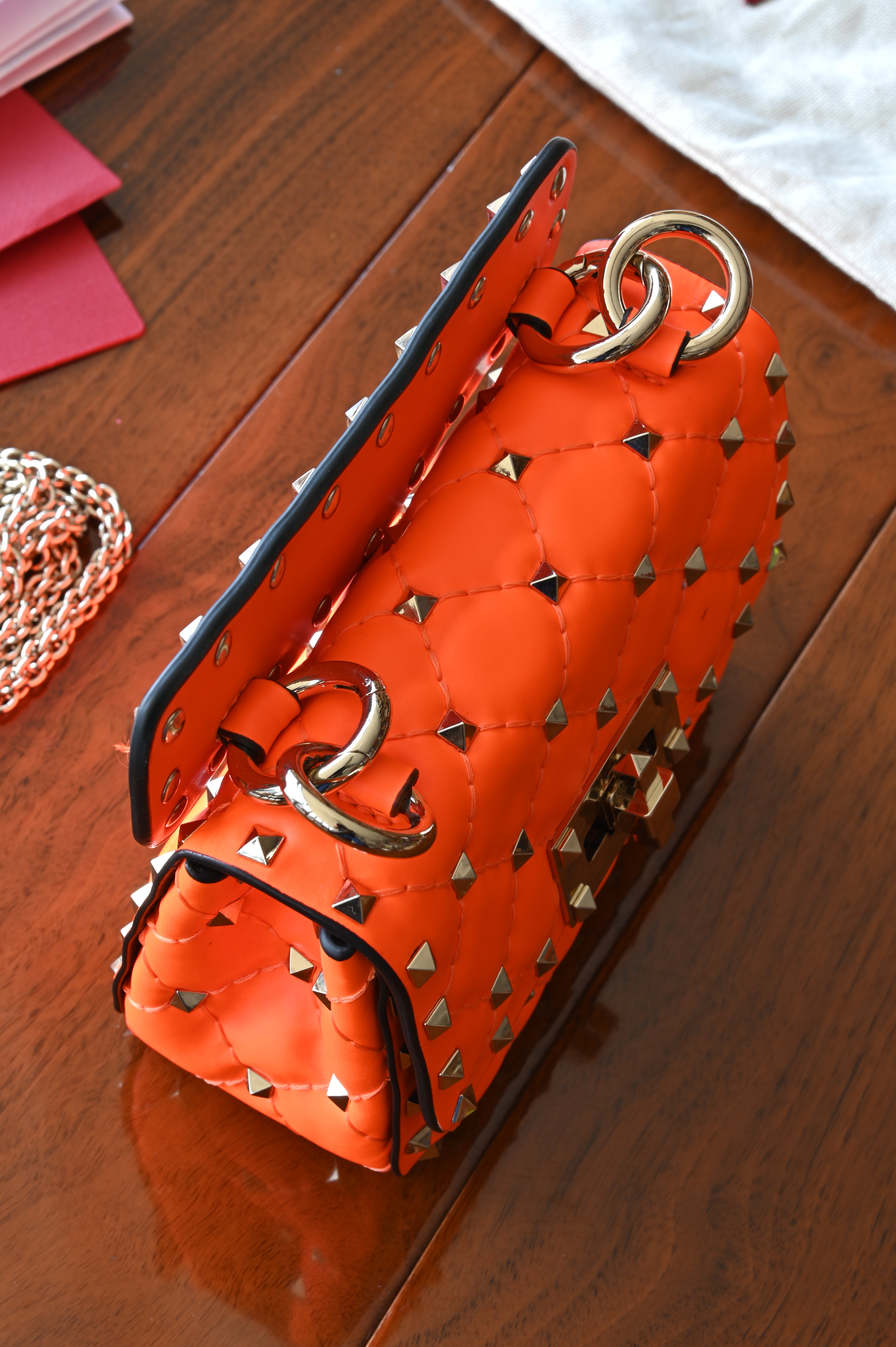 Valentino Garavani Mini Orange Rockstud Shoulder Bag top