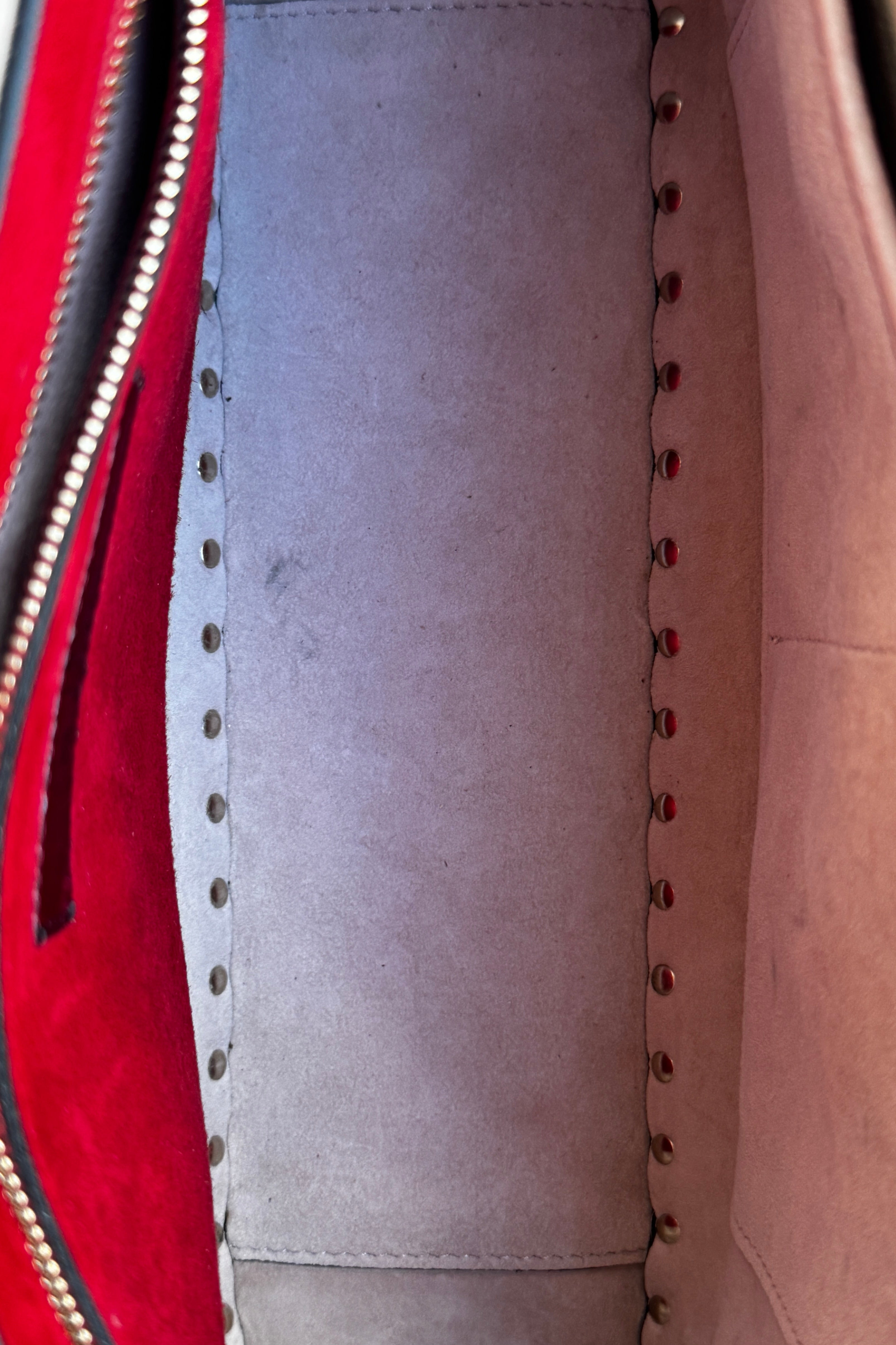 Valentino Garavani Pink Rockstud Bag inside