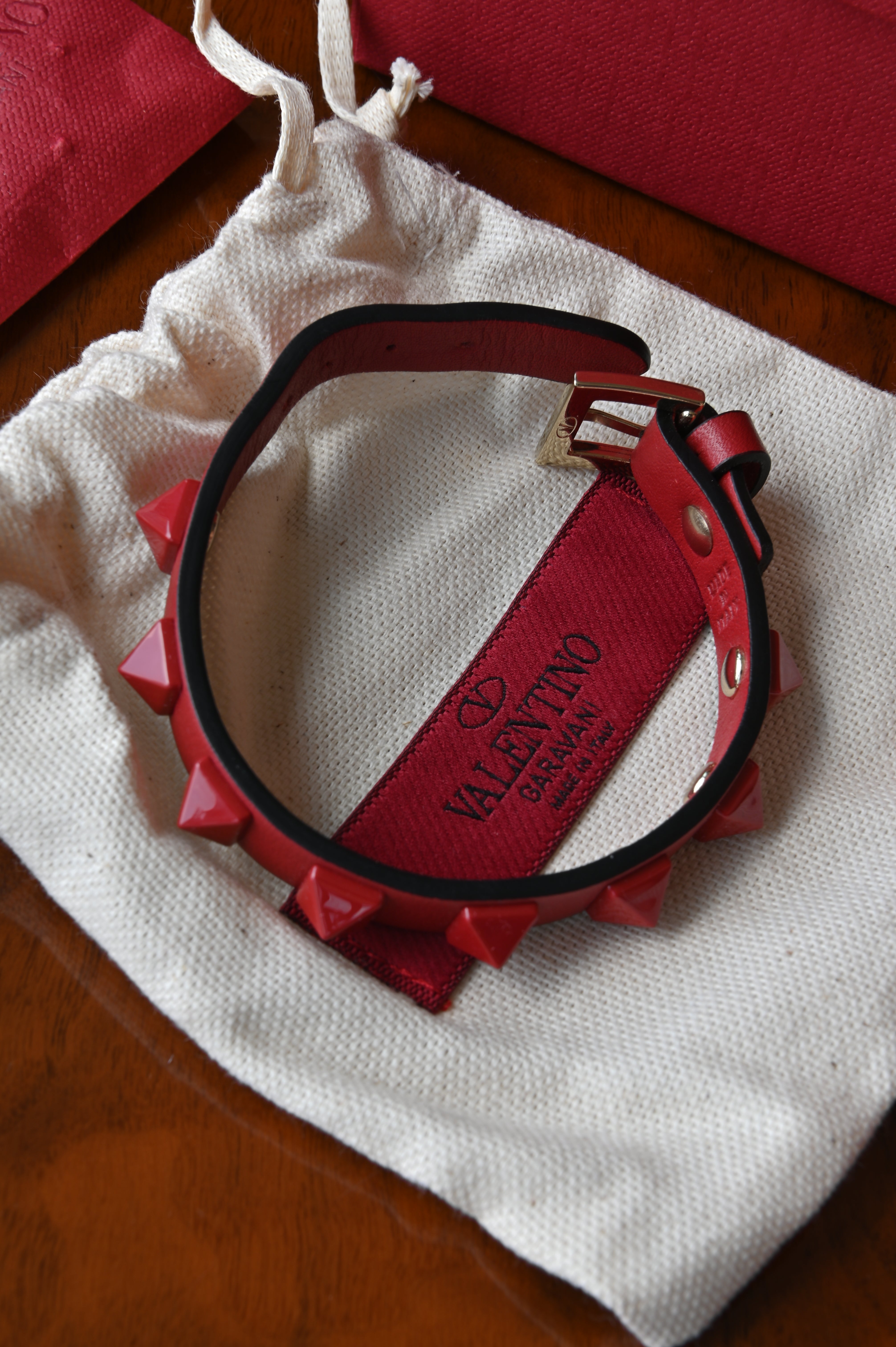 Valentino Garavani Red Rockstud Leather Bracelet logo