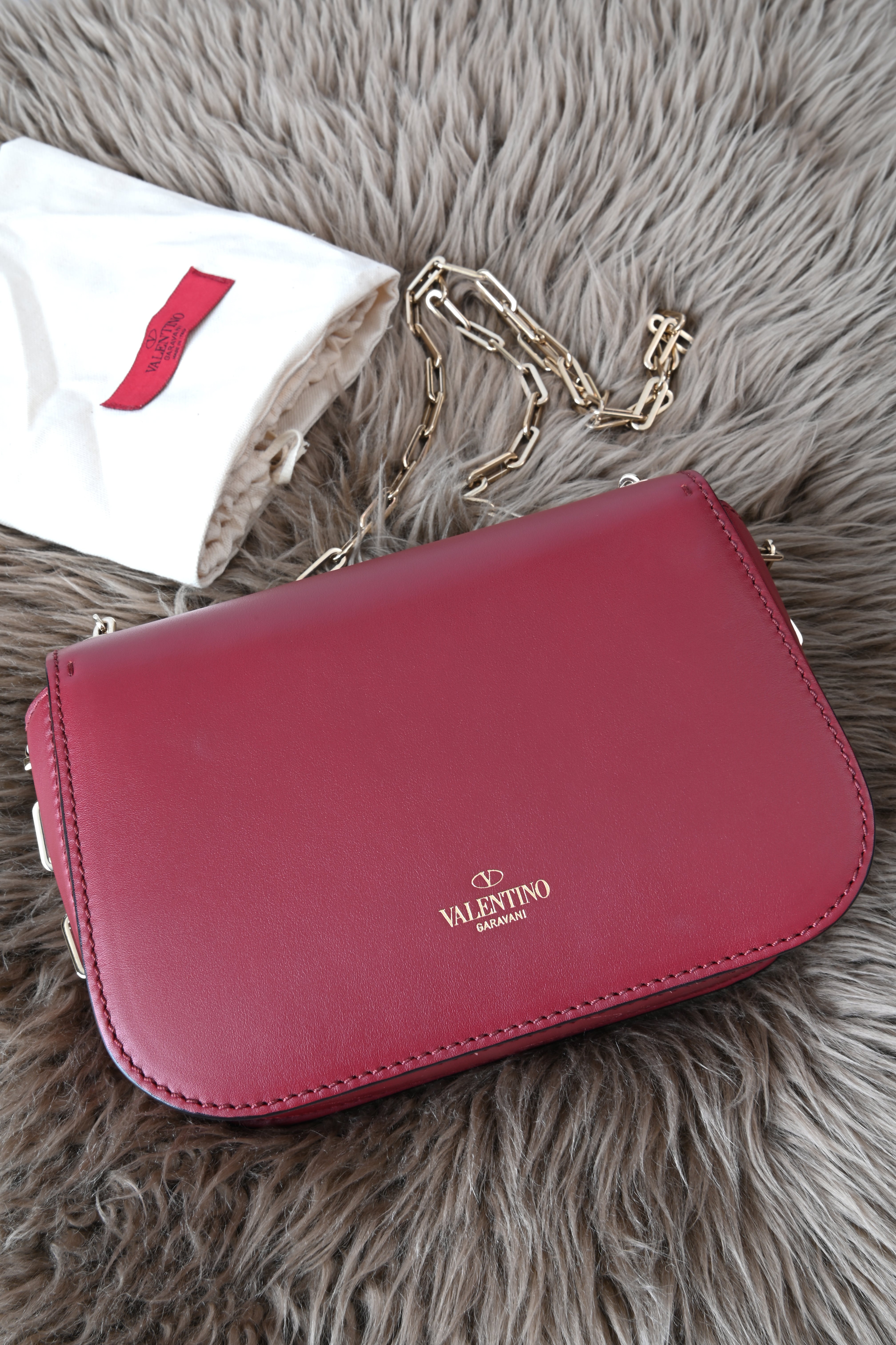 Valentino Garavani Burgundy flap chained bag