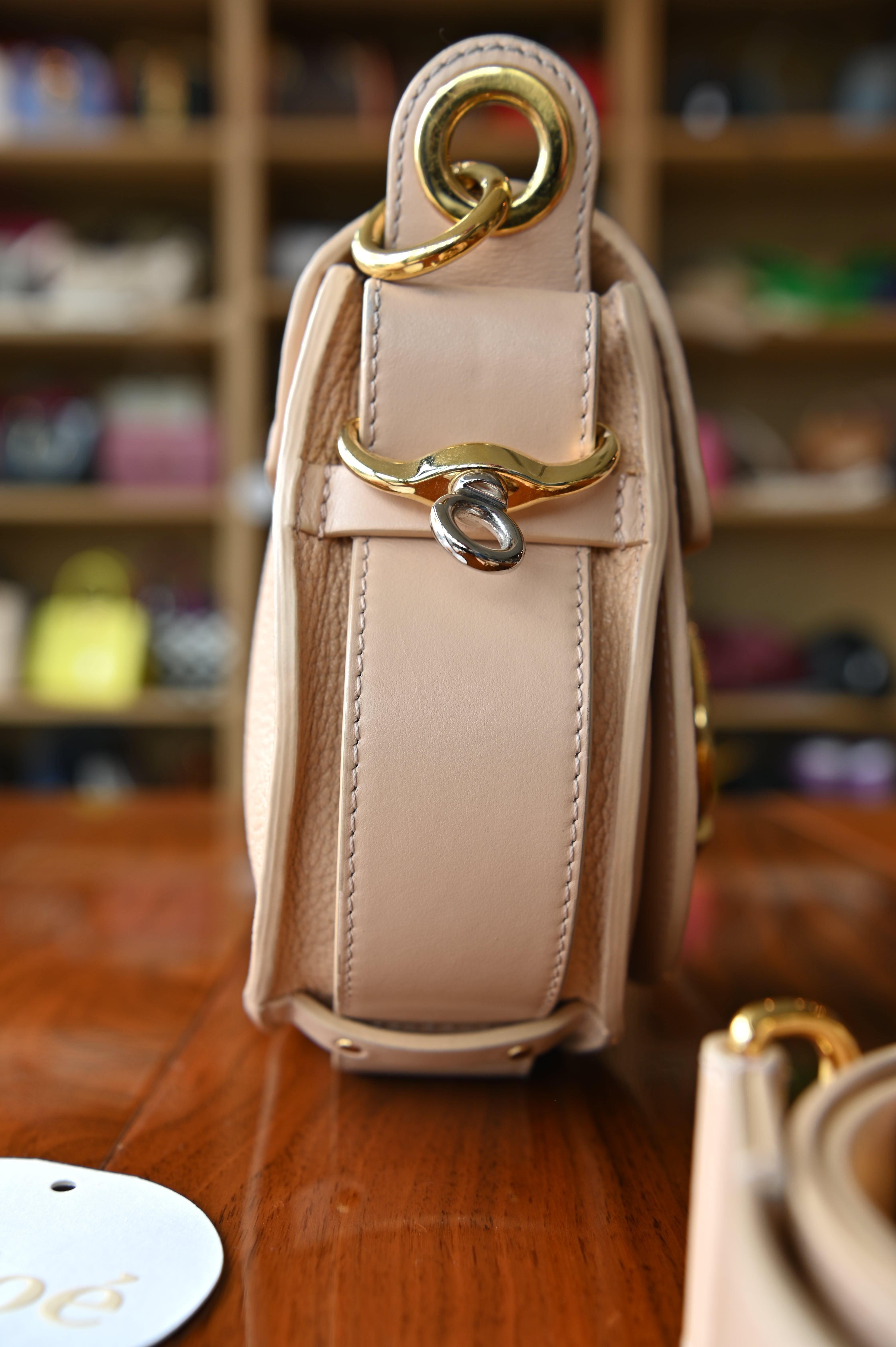 Side profile of Chloé Small Tess Dusty Rose leather bag
