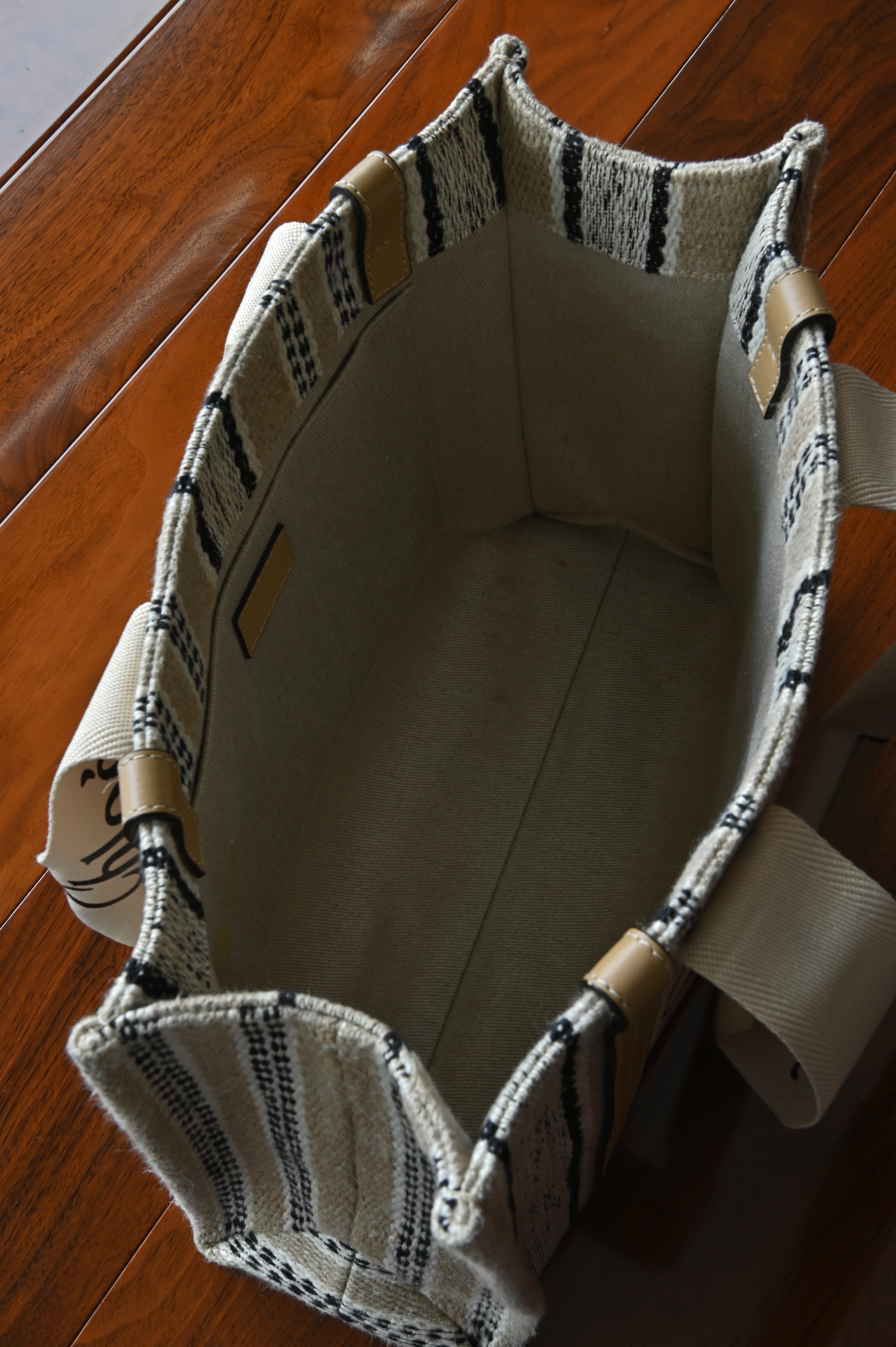 Authentic Chloé Woody Medium Striped Tote Bag showing the open top with spacious interior for everyday essentials.
