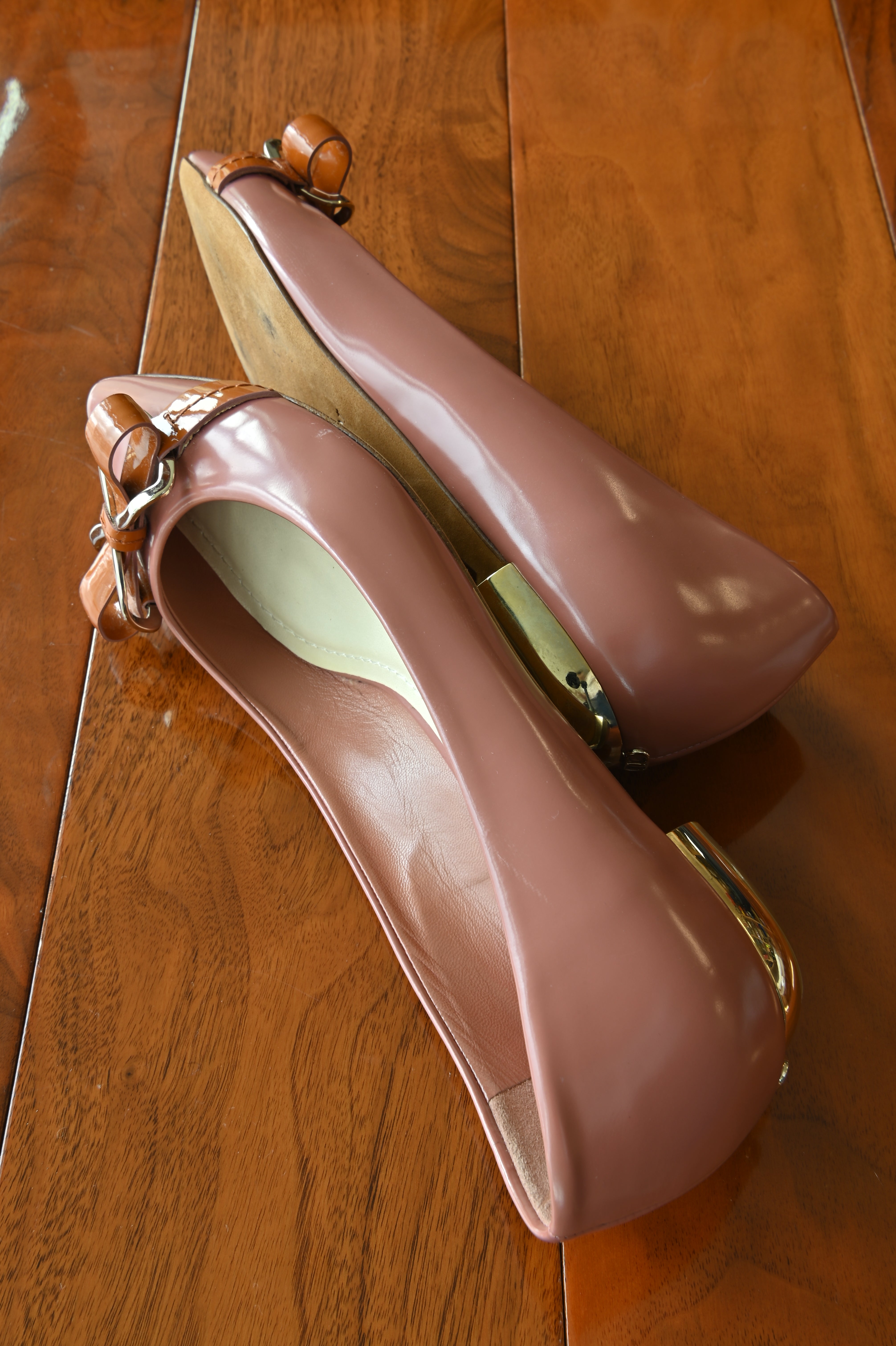 Authentic Christian Dior Dusty Rose Patent Ballet Flats showing the right side profile with elegant patent leather construction and flat sole.