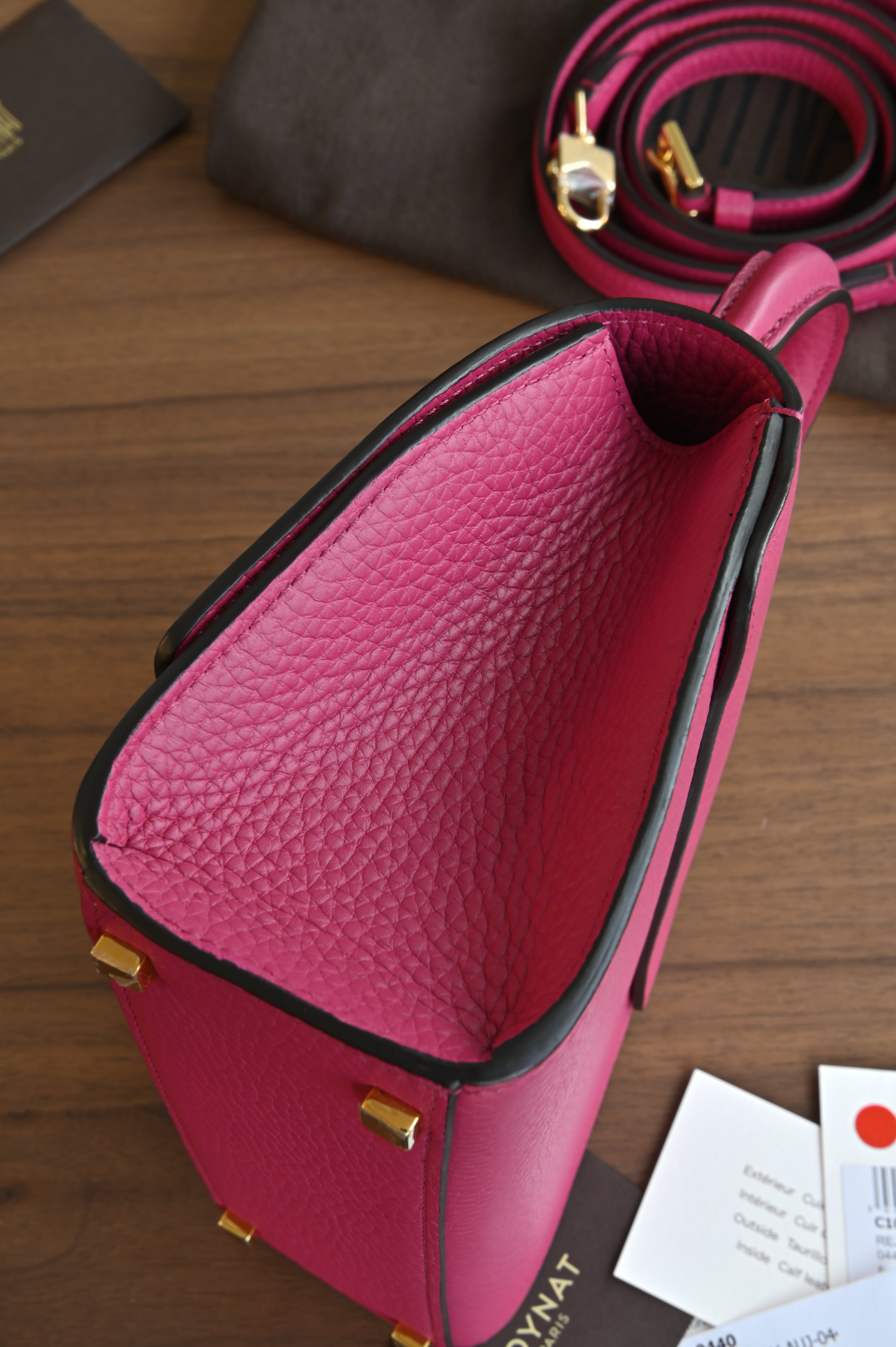 Authentic preloved Moynat Rejane BB in fuchsia pink Taurillon leather – side view
