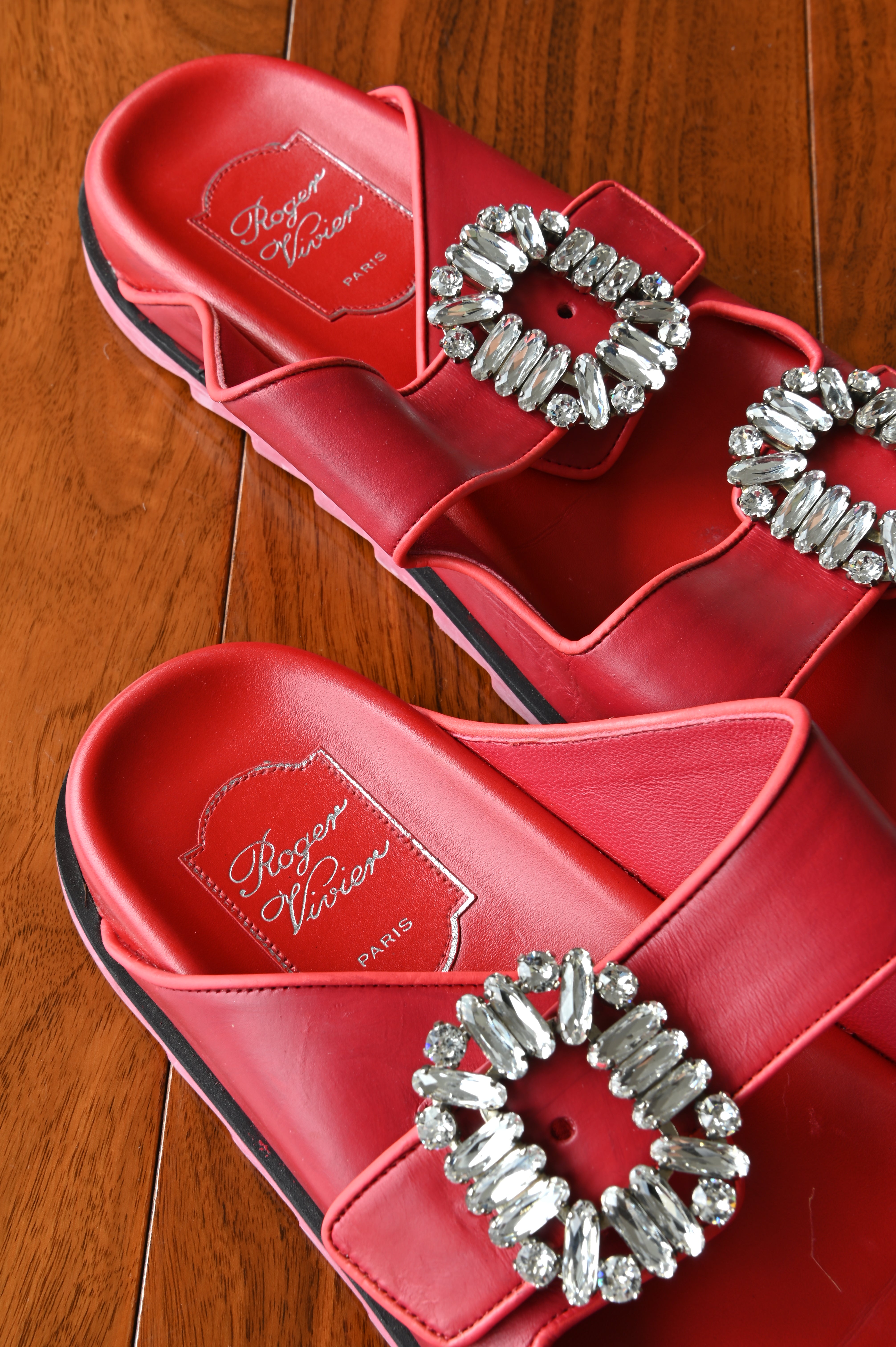 Close-up of the Roger Vivier Paris leather footbed and branding highlighting the clean interior condition of the slides.