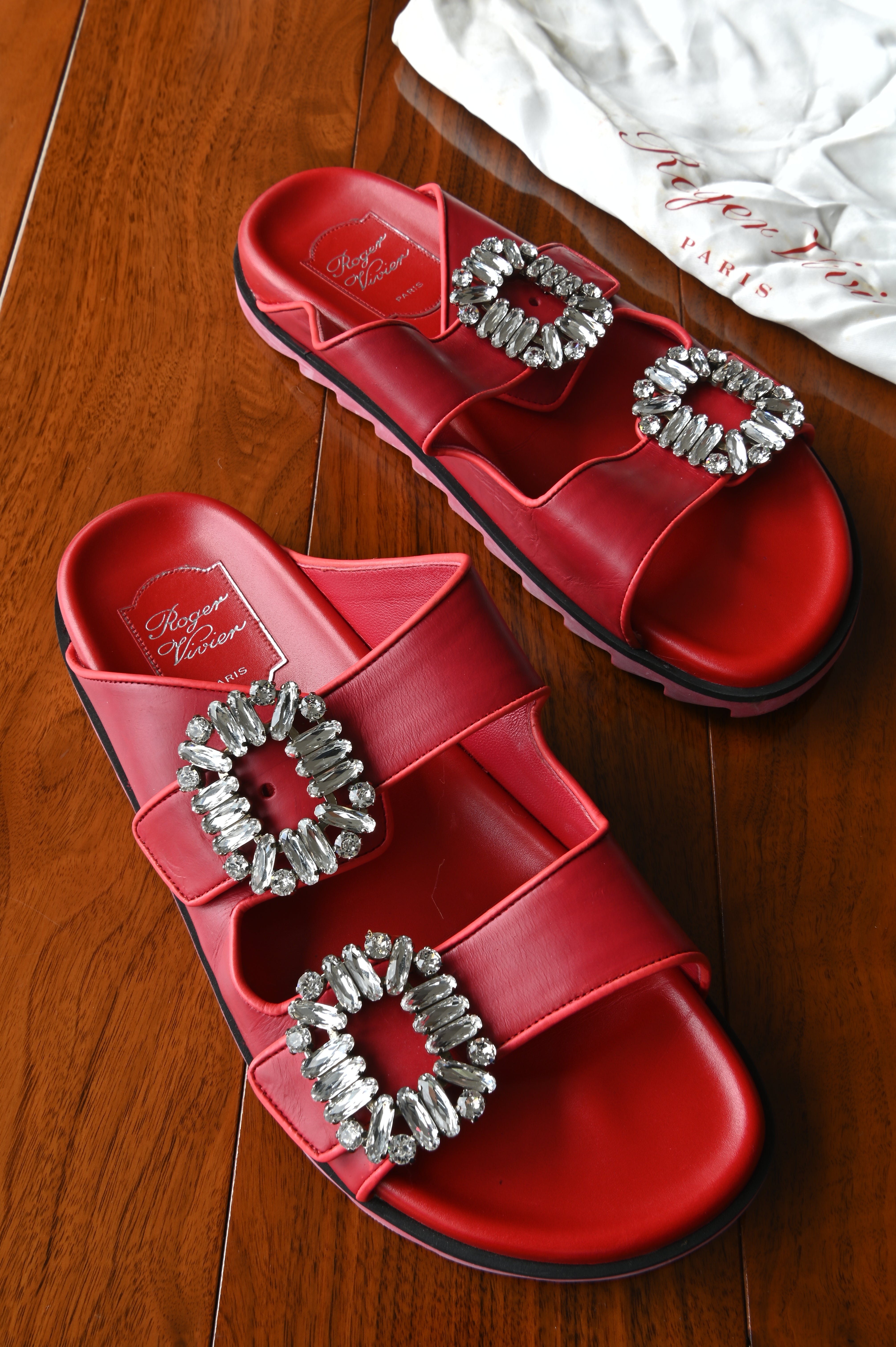 Authentic Roger Vivier Viv’ Ranger red leather slides featuring signature crystal strass buckles and double strap design.
