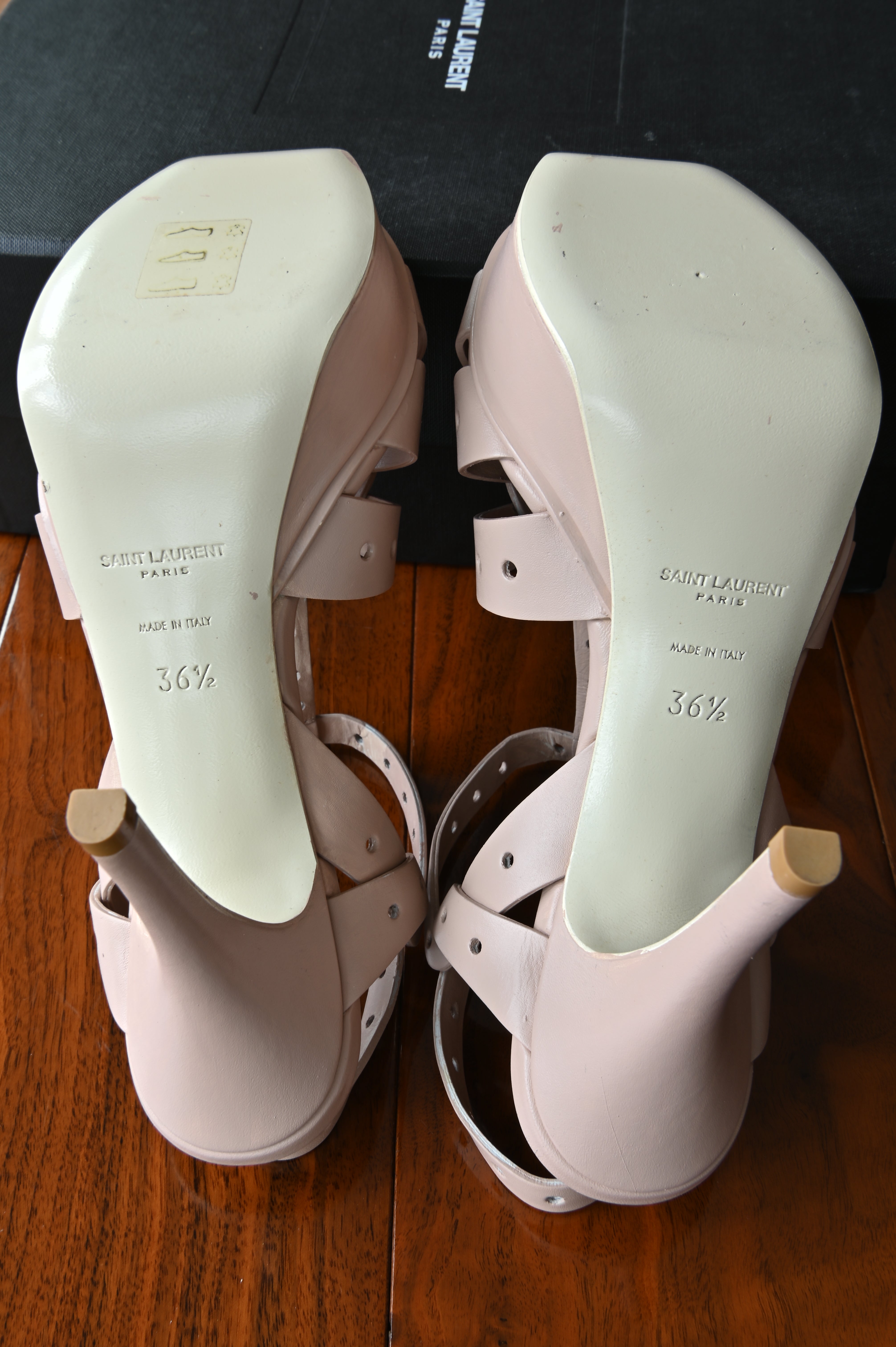 Outsole of authentic Saint Laurent Tribute Platform Sandals showing unworn soles